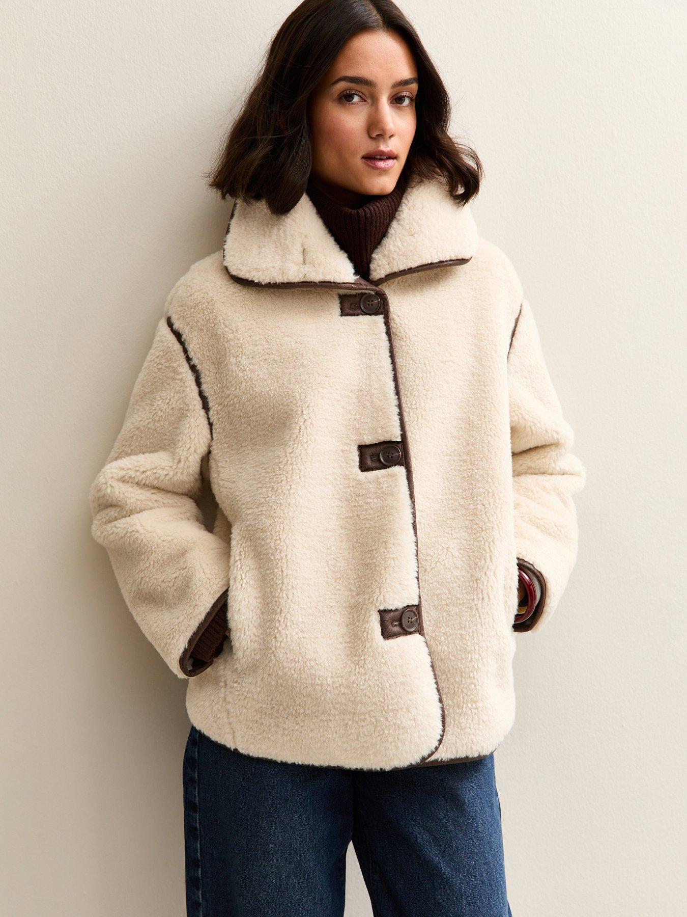 Image 1 of 7 of New Look Cream Faux Fur Bonded Jacket