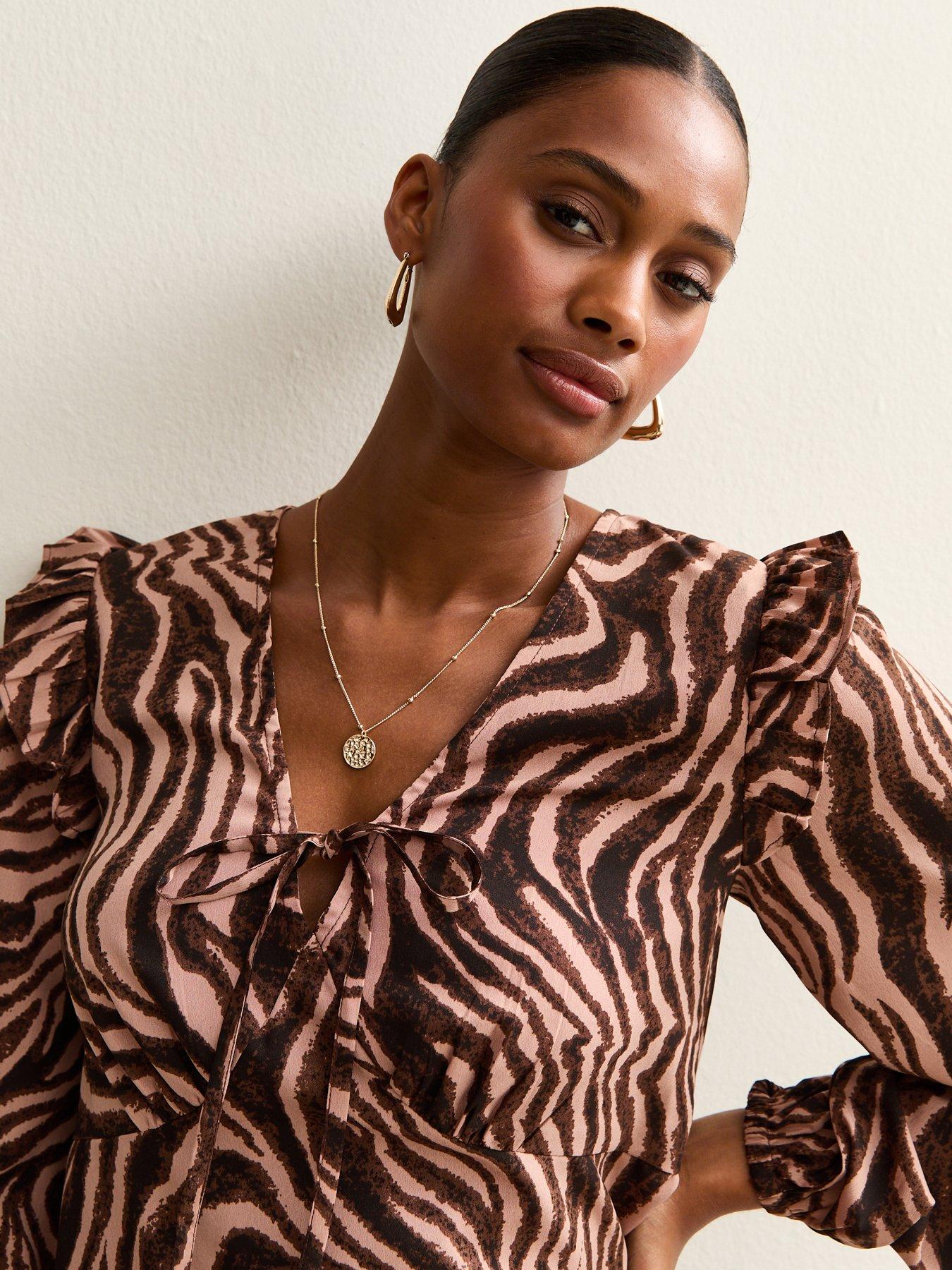 Image 5 of 6 of New Look Zoe Zebra Ruffle Tea Blouse - Brown
