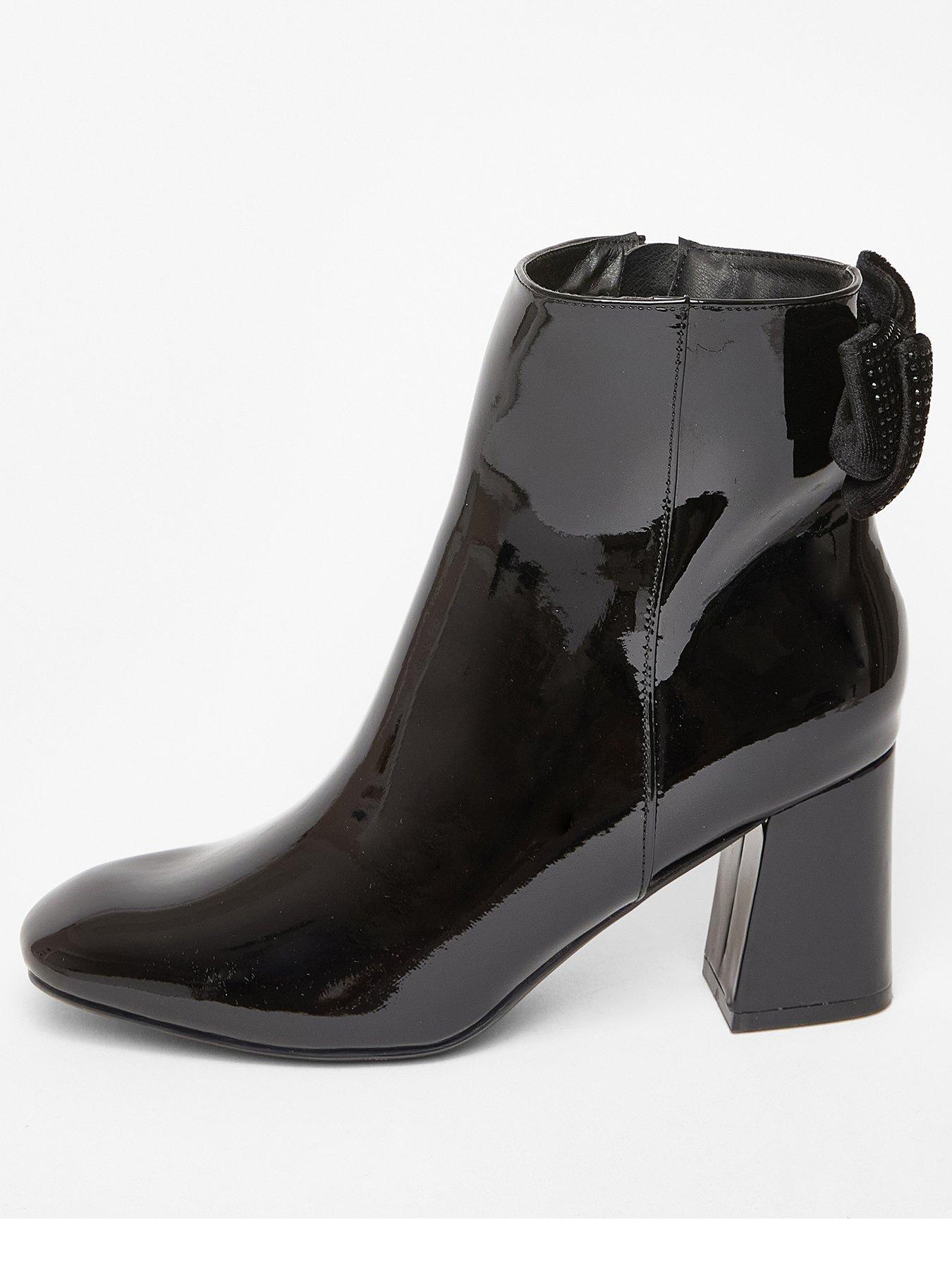 Image 1 of 5 of Quiz Black Patent Bow Back Ankle Boot