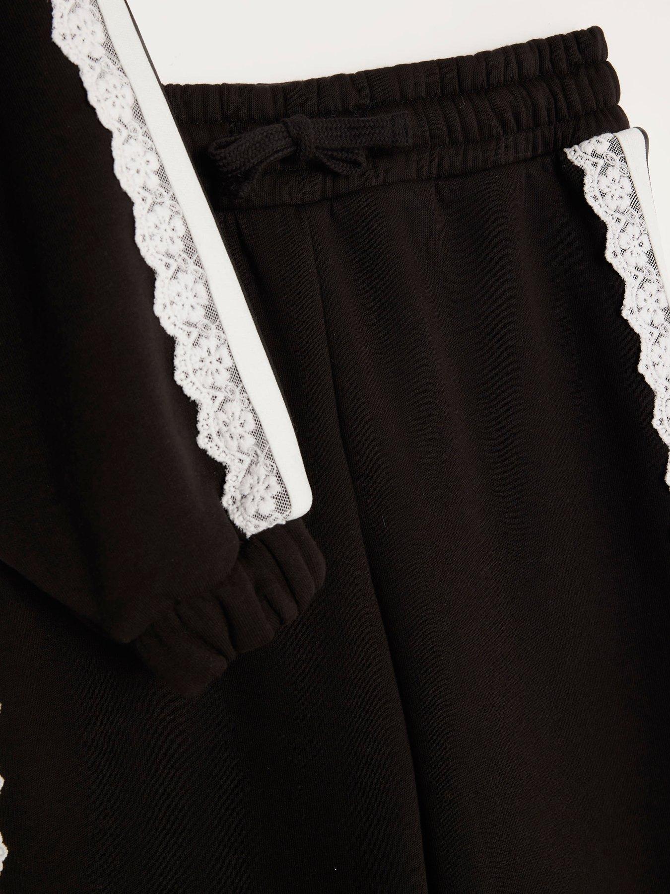 Image 3 of 4 of River Island Older Girls Ruffle Lace Detail Sweatshirt Set - Black