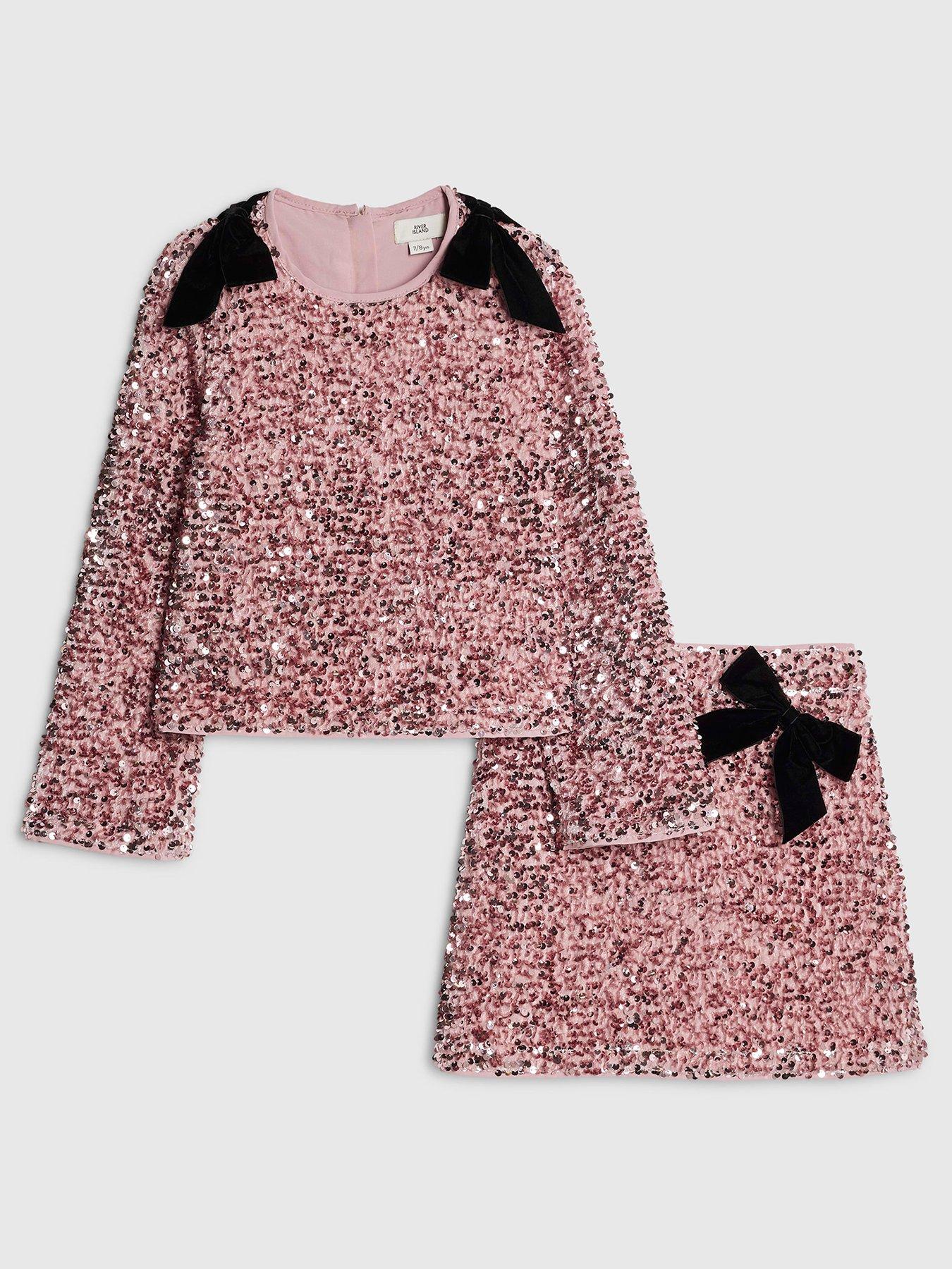 Image 1 of 5 of River Island Older Girls Sequin Bow Long Sleeved Skirt Set - Pink