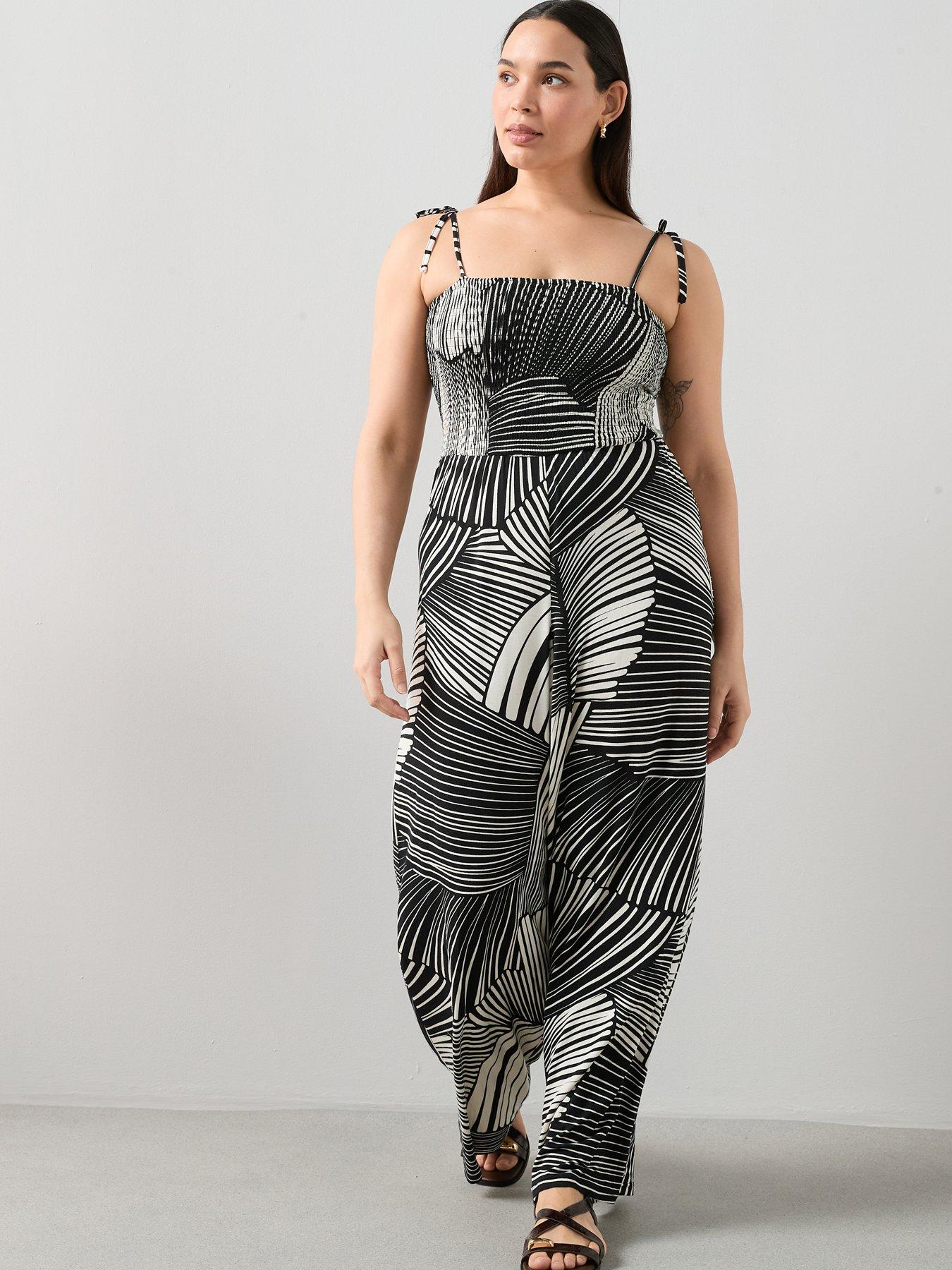 Image 1 of 6 of The Very Collection Curve Tie Strap Jumpsuit