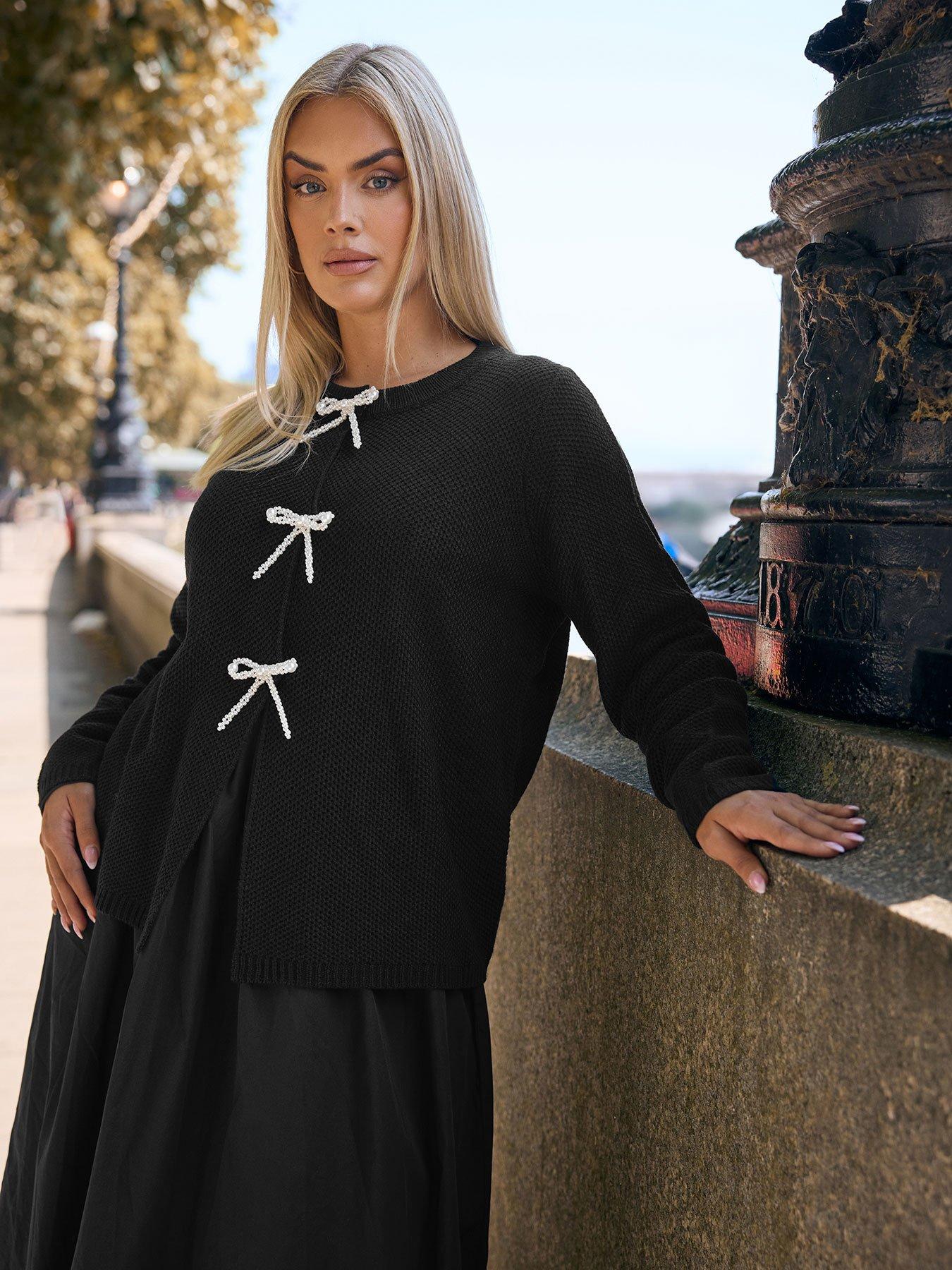 undefined Curve Pearl Bow Button Cardigan