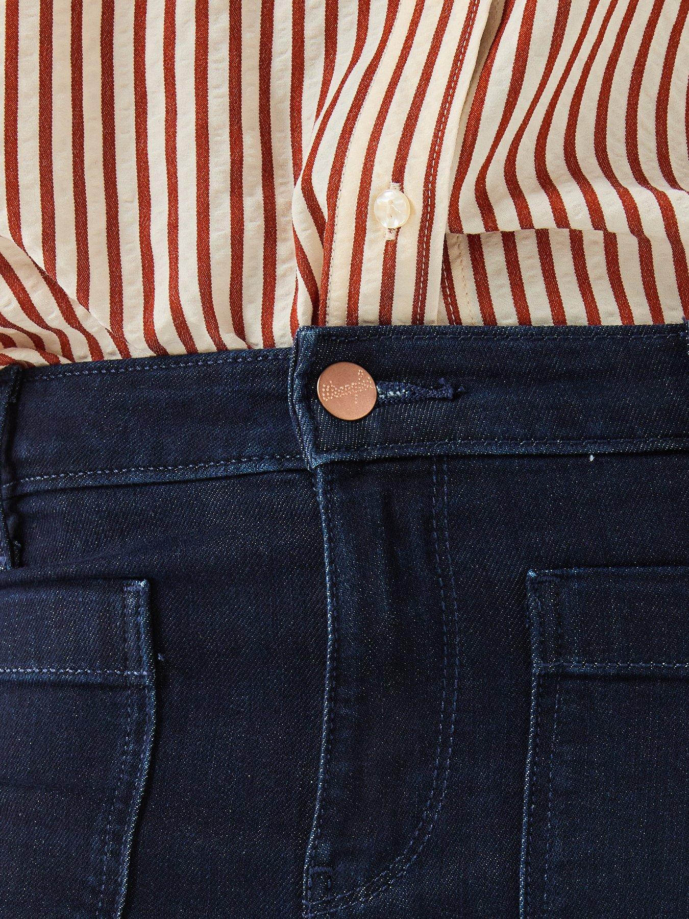 Image 4 of 6 of Wrangler Flare Jeans - Soft Moonlight Blue
