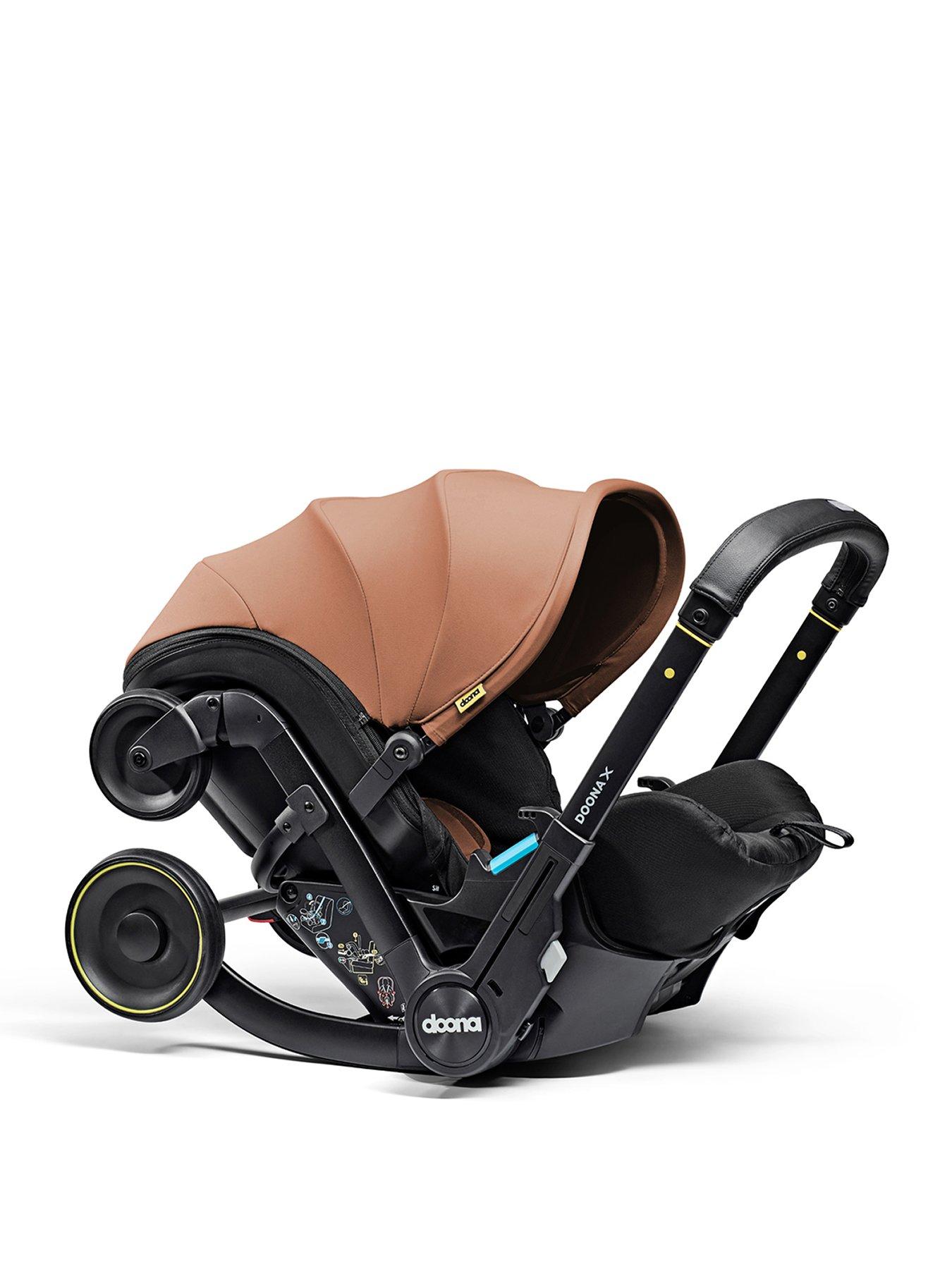 Image 1 of 7 of Doona X Car Seat - Terracotta