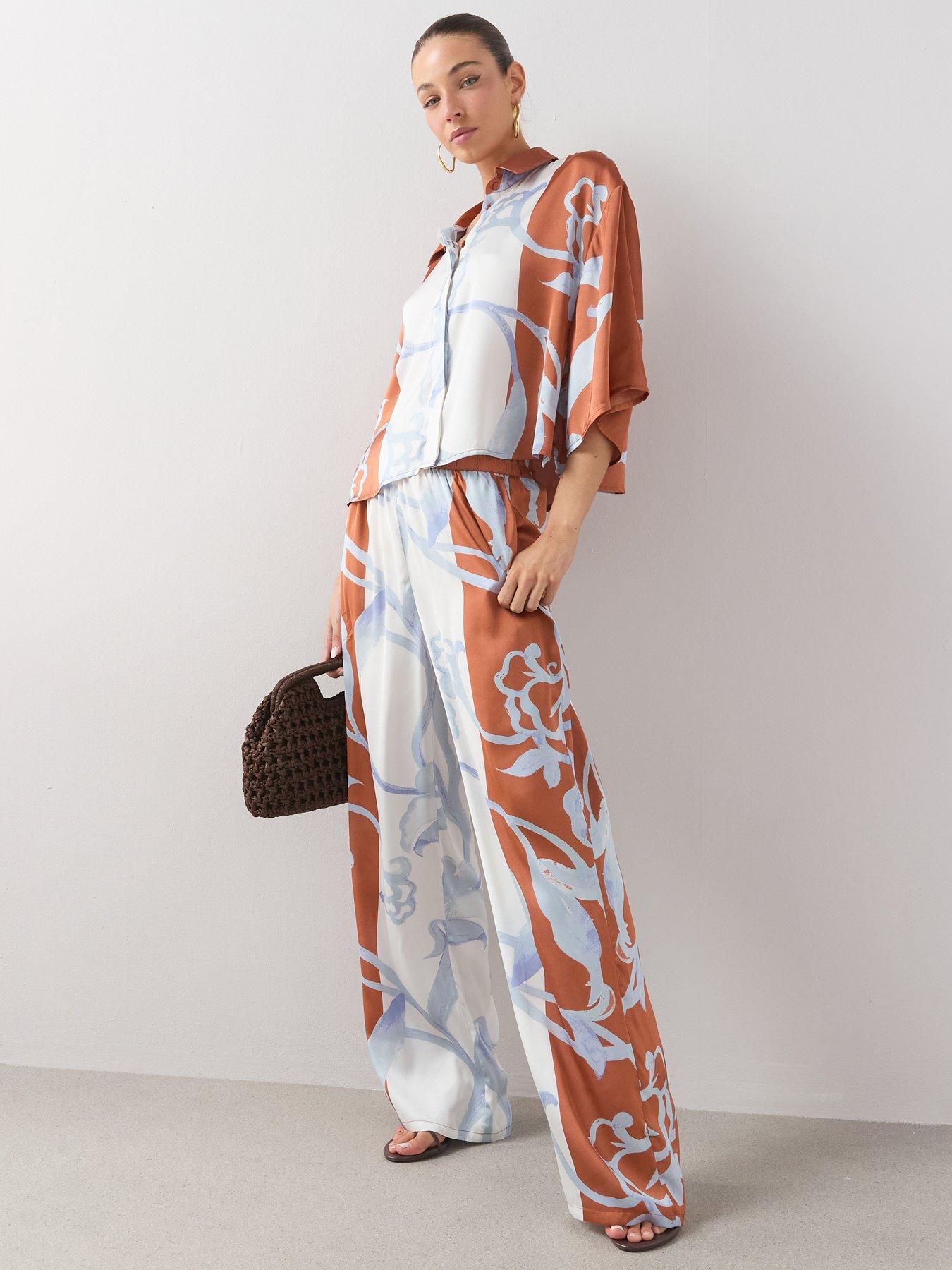 Image 1 of 7 of The Very Collection Printed Elasticated Satin Wide Leg Co-Ord Trousers Printed - Print
