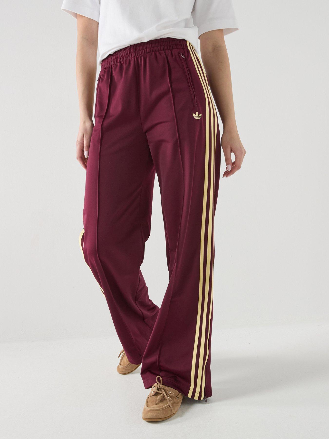 Image 1 of 7 of adidas Originals Firebird Loose Track Pants - Maroon/Yellow