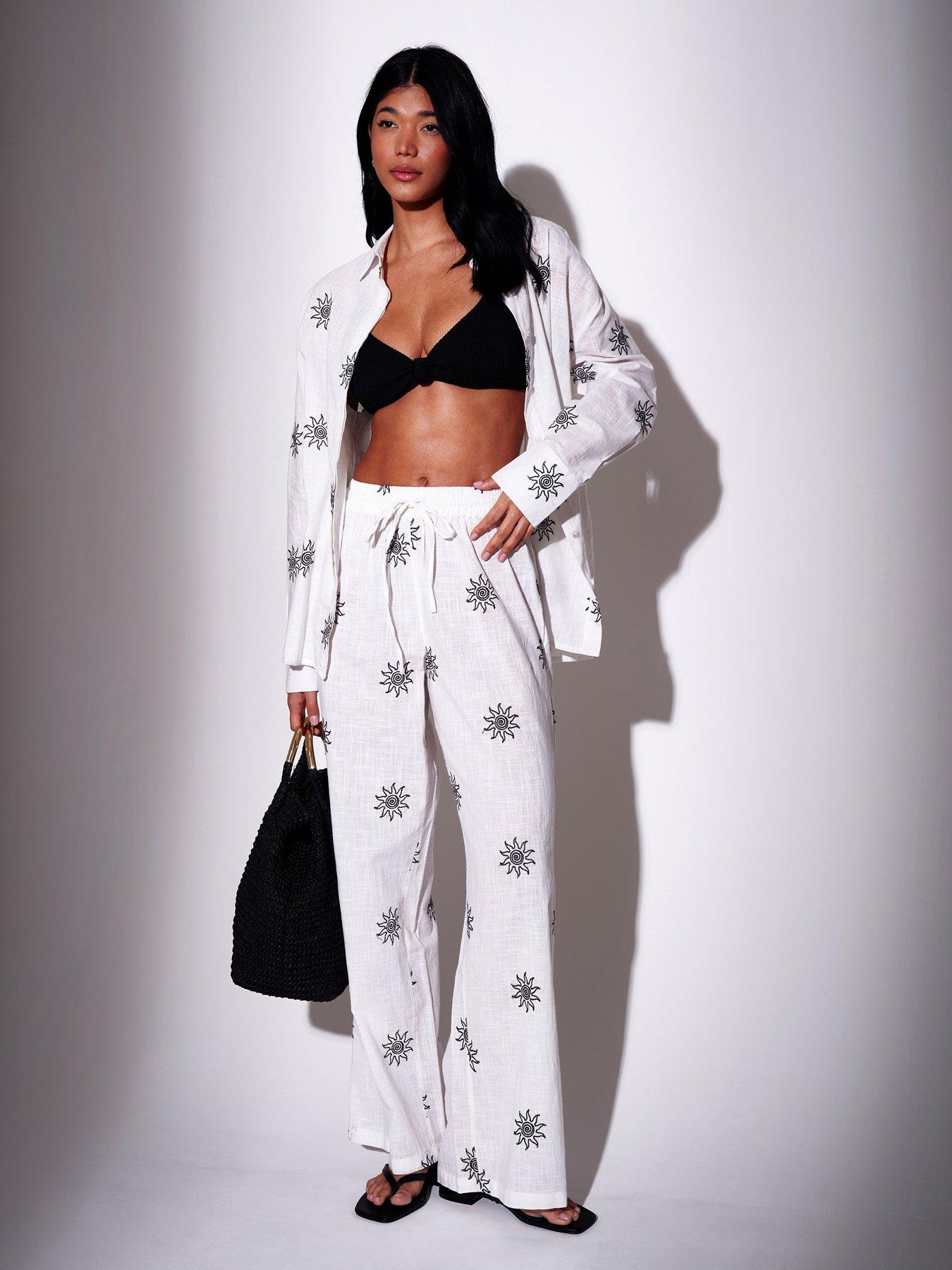 Image 1 of 5 of South Beach Embroidered Celestial Sun Wide Leg Trousers &nbsp;-White