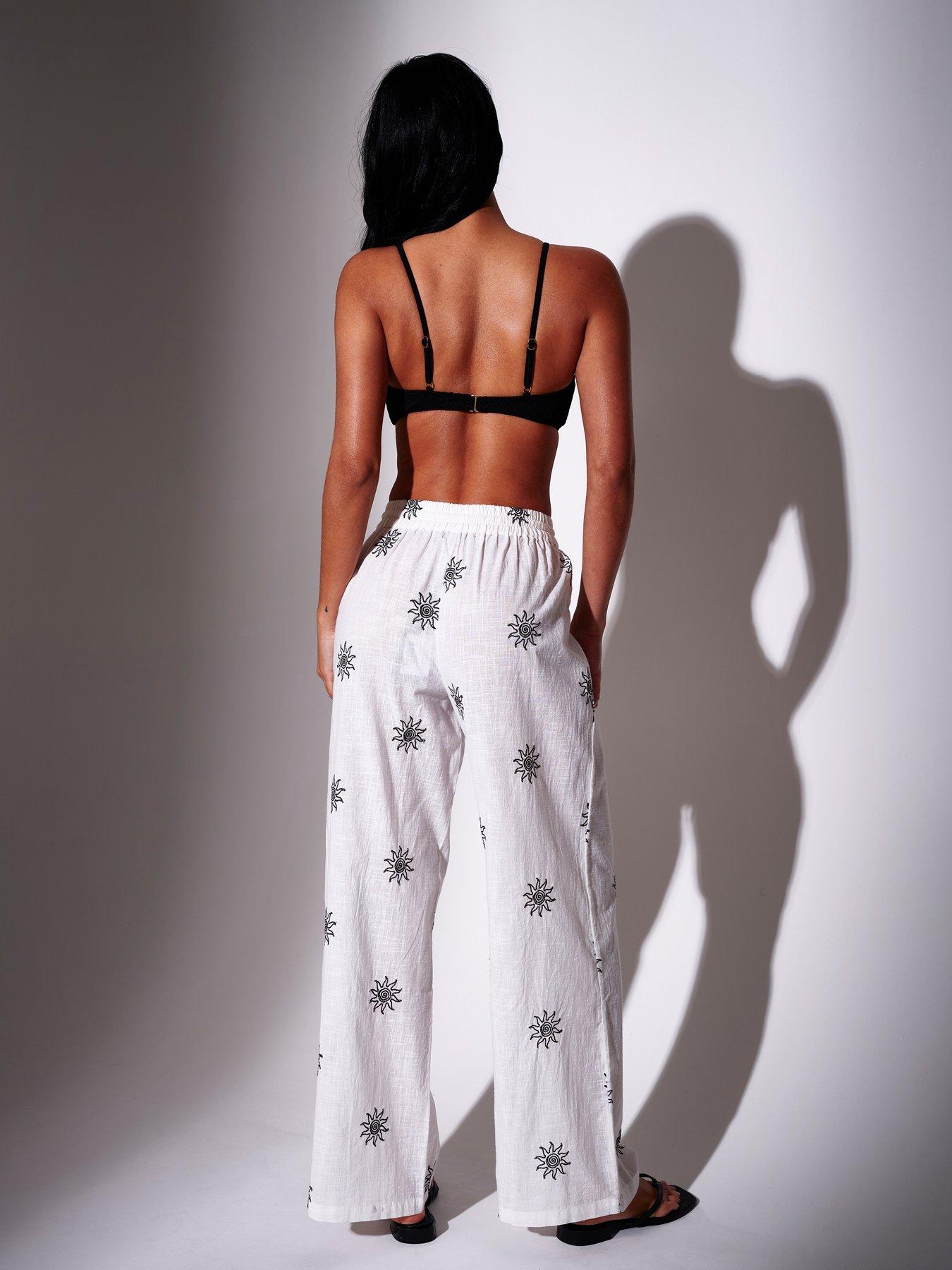 Image 4 of 5 of South Beach Embroidered Celestial Sun Wide Leg Trousers &nbsp;-White