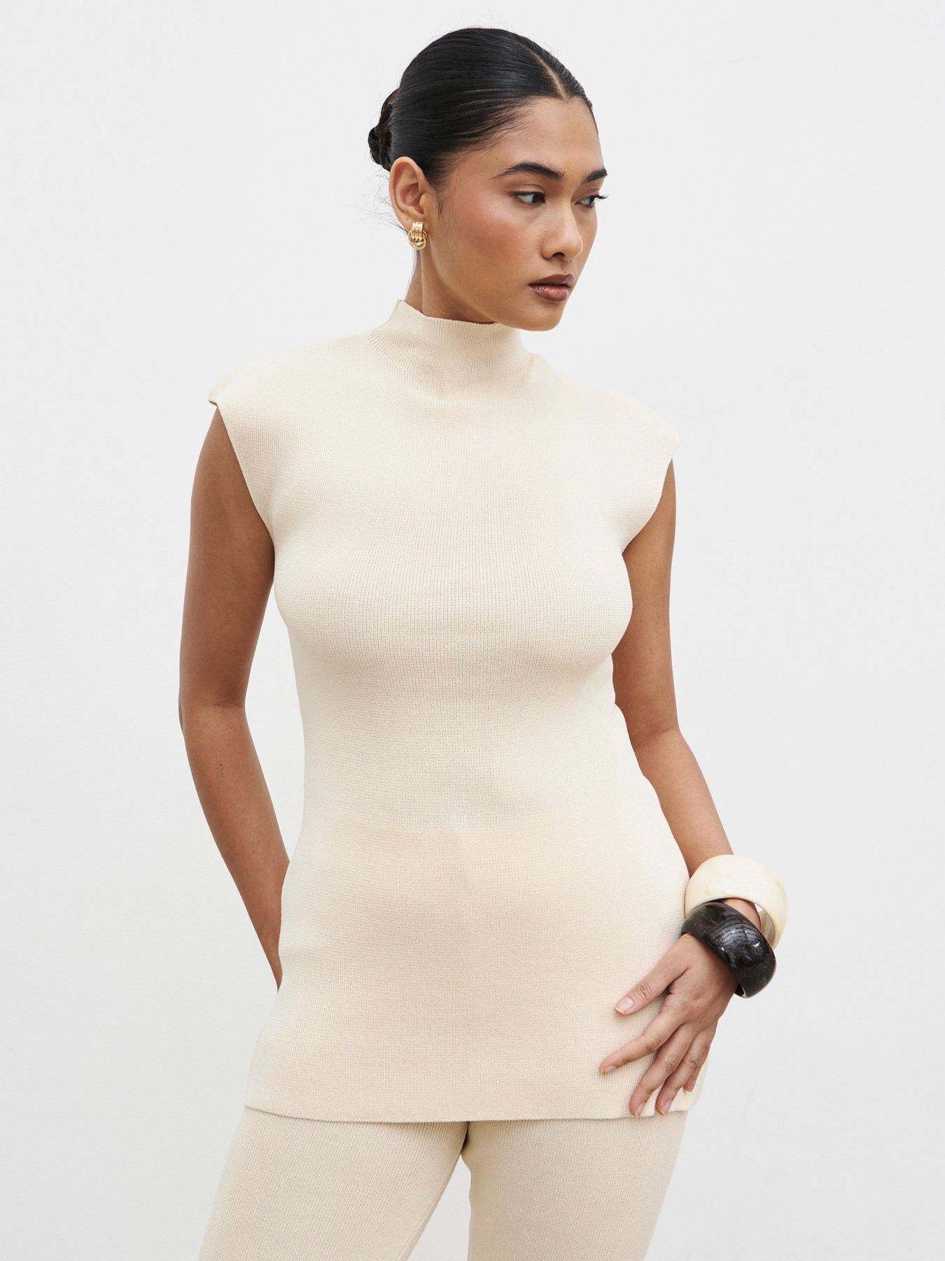 Image 1 of 4 of Pretty Lavish Ashlyn High Neck Knit Top - Cream
