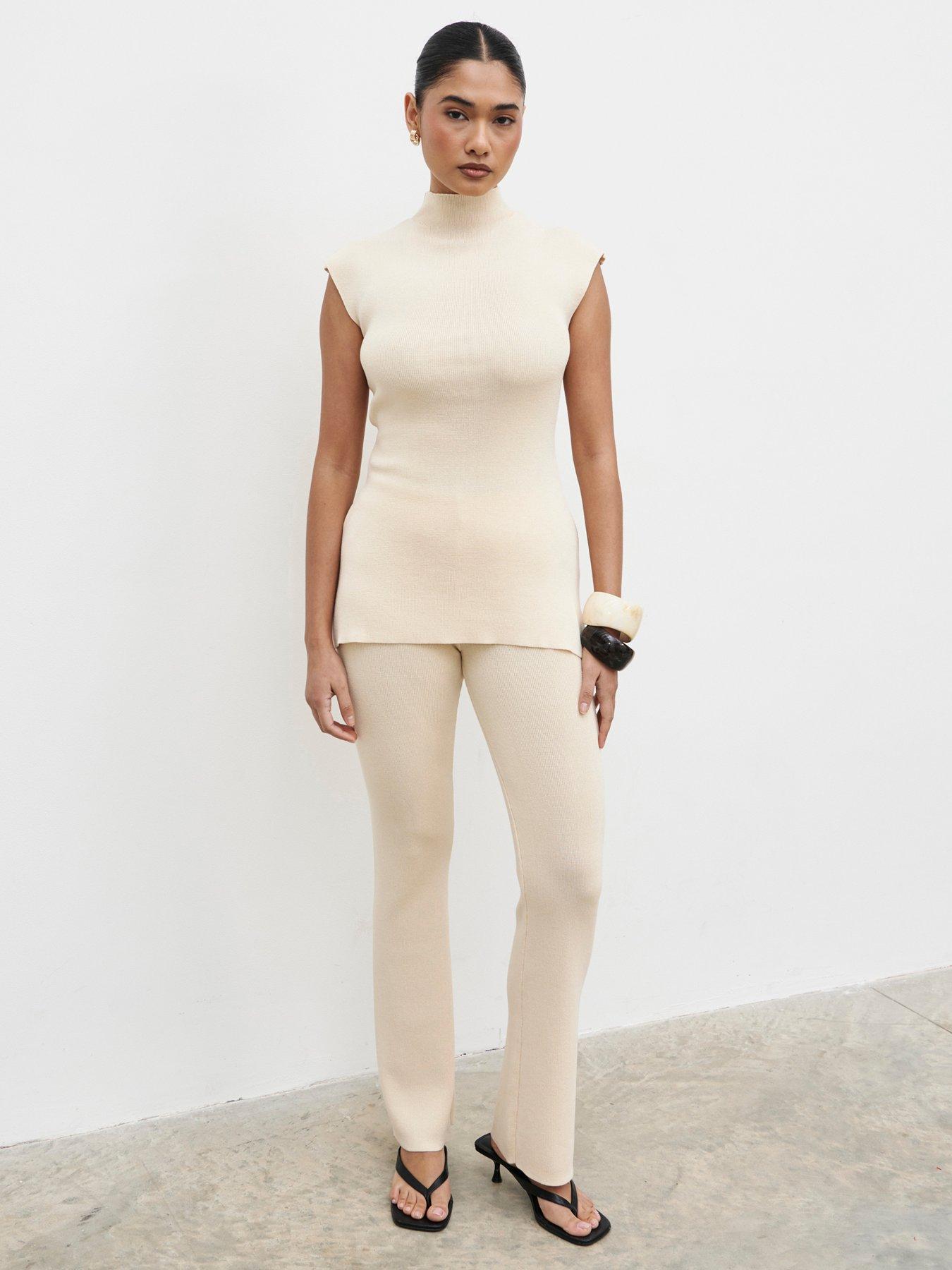 Image 4 of 4 of Pretty Lavish Ashlyn High Neck Knit Top - Cream