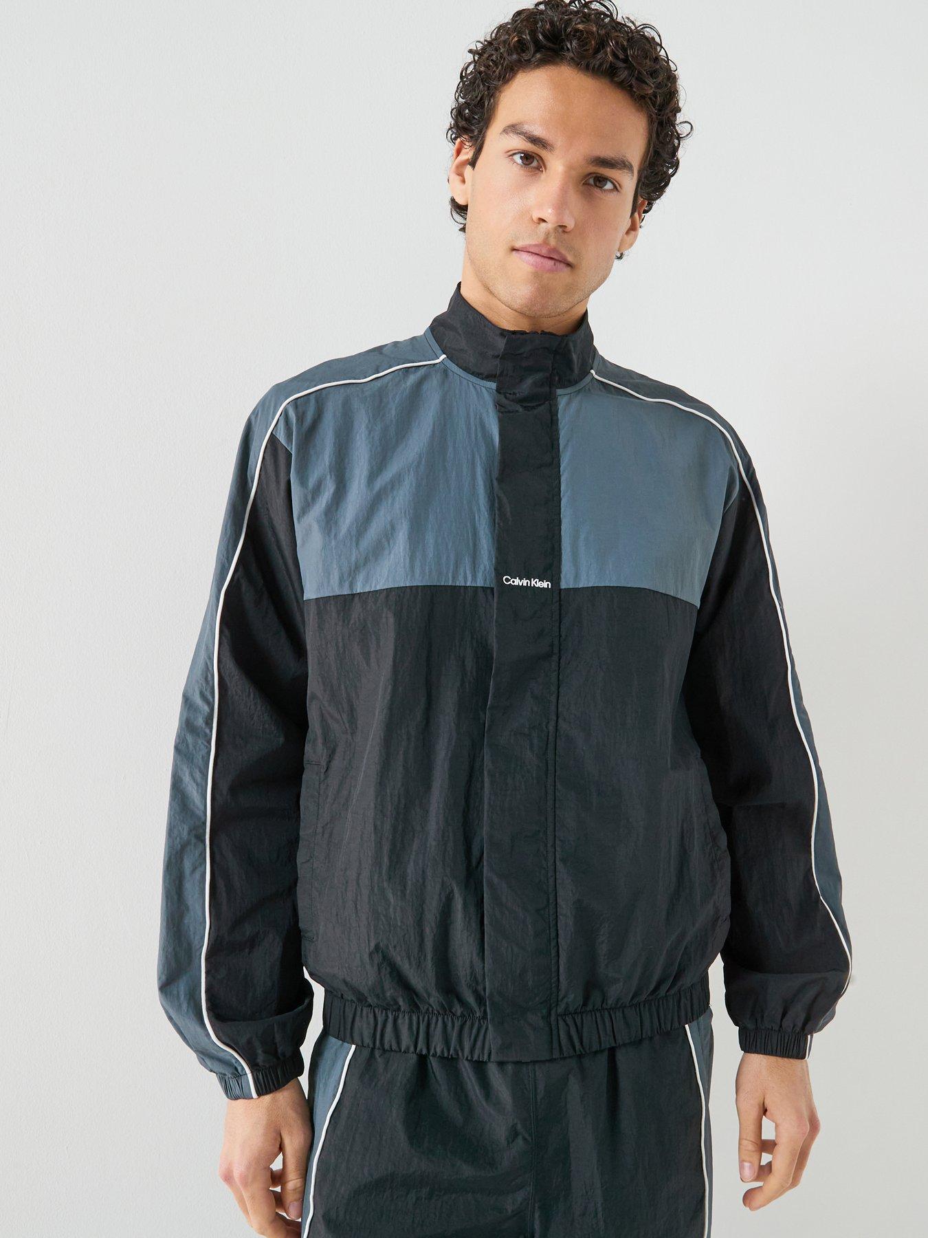 Image 1 of 6 of Calvin Klein Sport Go Out Commuter Colorblock Nylon Full Zip Track Top - Black