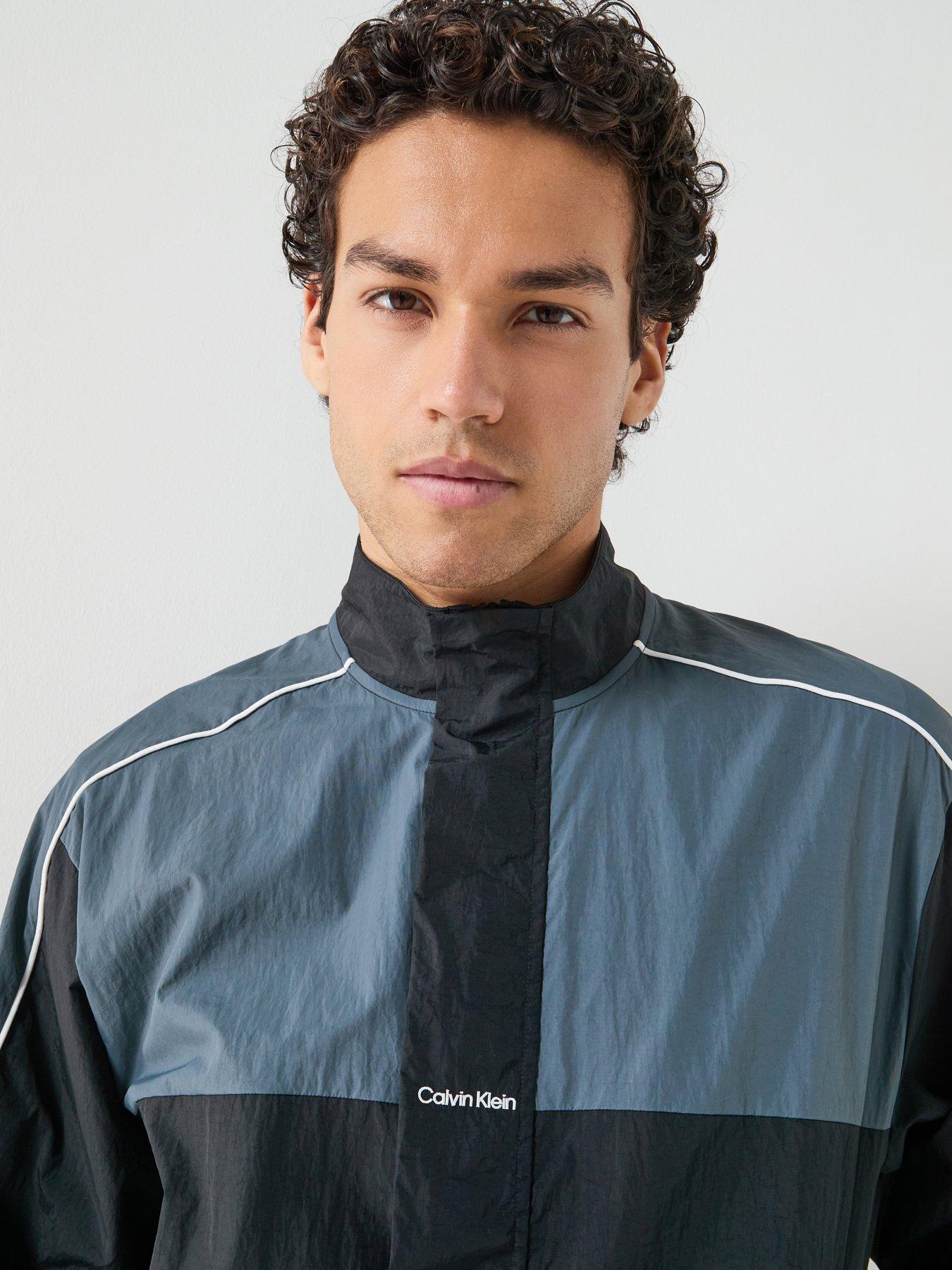 Image 4 of 6 of Calvin Klein Sport Go Out Commuter Colorblock Nylon Full Zip Track Top - Black