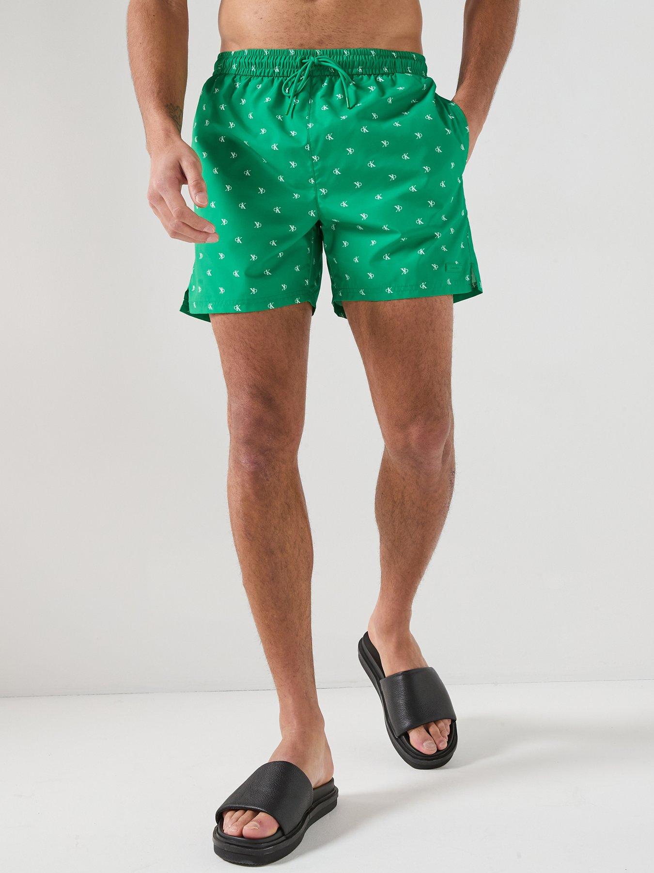 Image 1 of 5 of Calvin Klein Essenital All Over Logo Medium Swim Shorts - Green