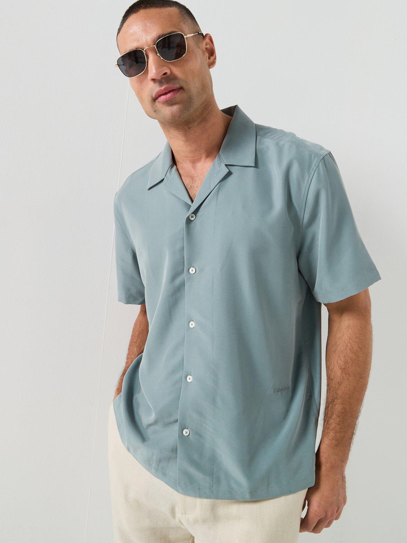 Image 1 of 6 of Calvin Klein Drapey Tencel Open Collar Short Sleeve Shirt - Blue