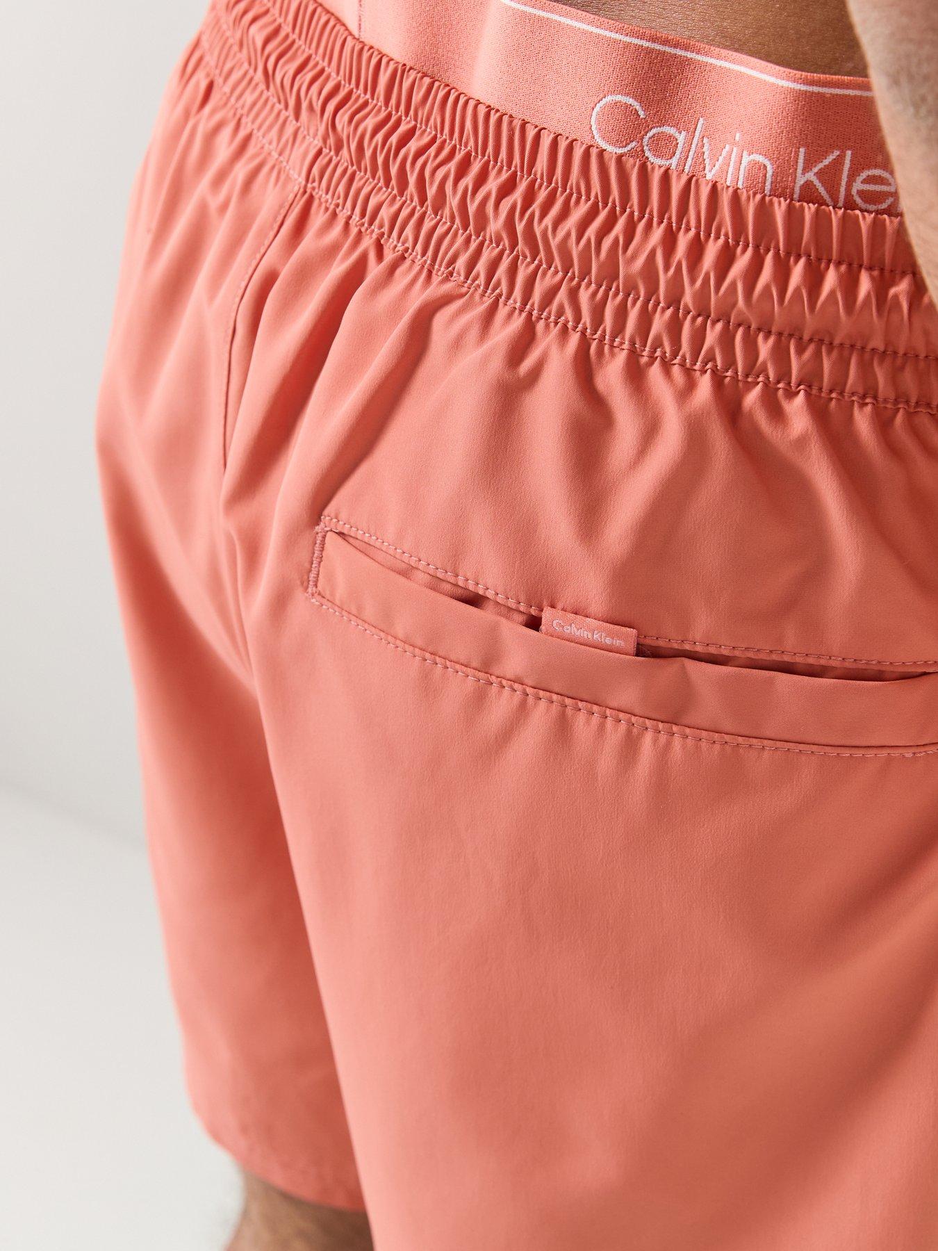 Image 5 of 5 of Calvin Klein Essential Double Waistband Medium Swim Shorts - Orange