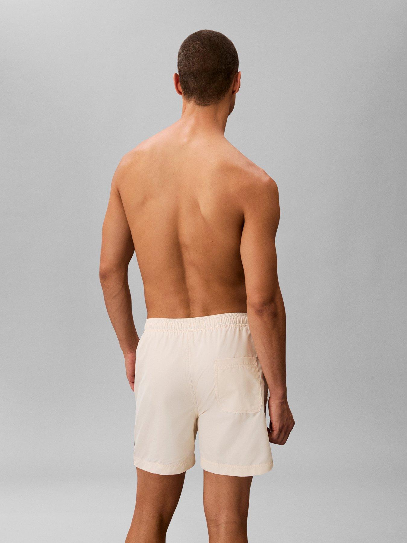 Image 2 of 4 of Calvin Klein Retro Sport Side Tape Logo Medium Swim Shorts - Beige