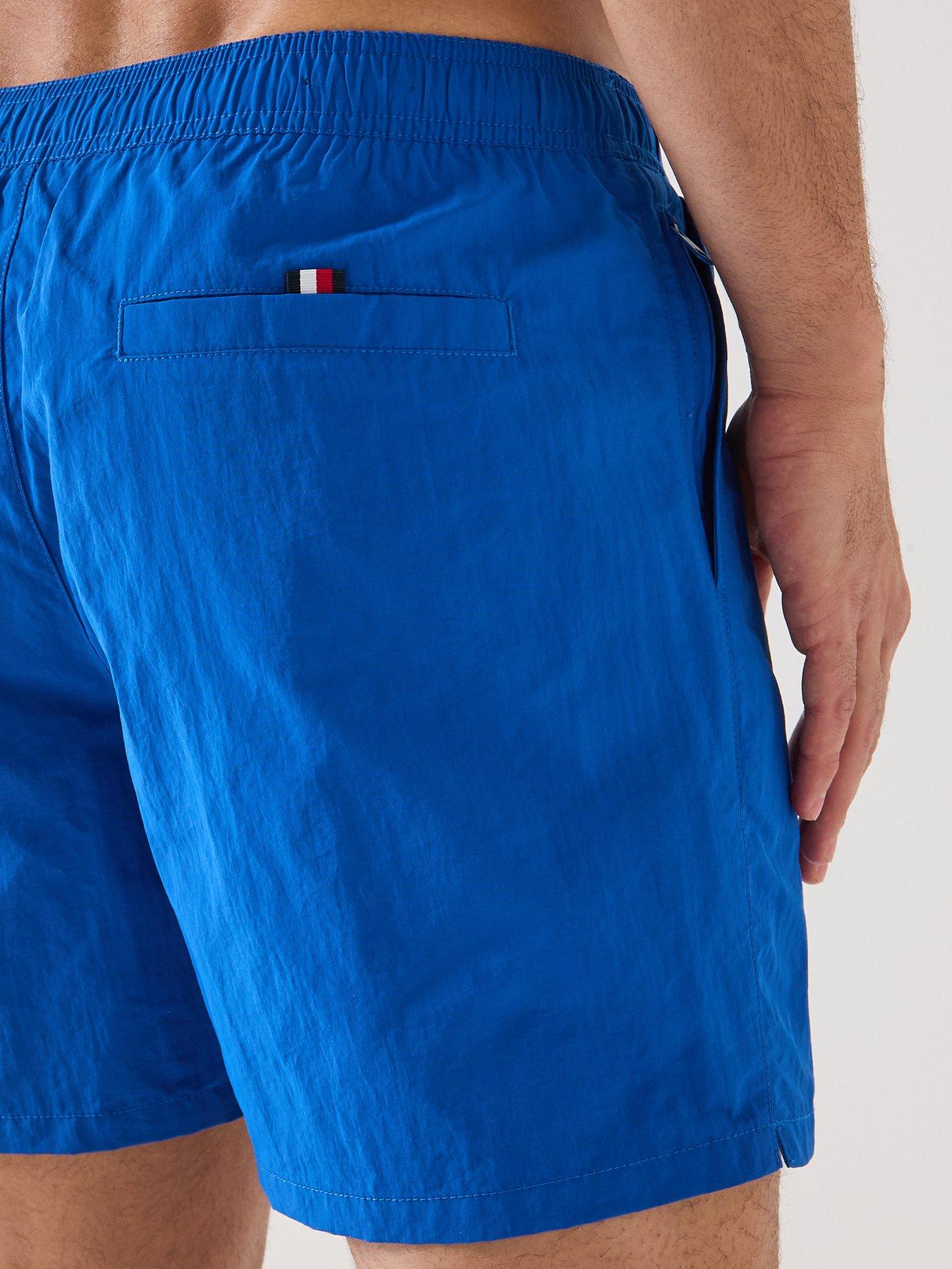 Image 4 of 6 of Tommy Hilfiger Side Linear Logo Swim Shorts - Blue