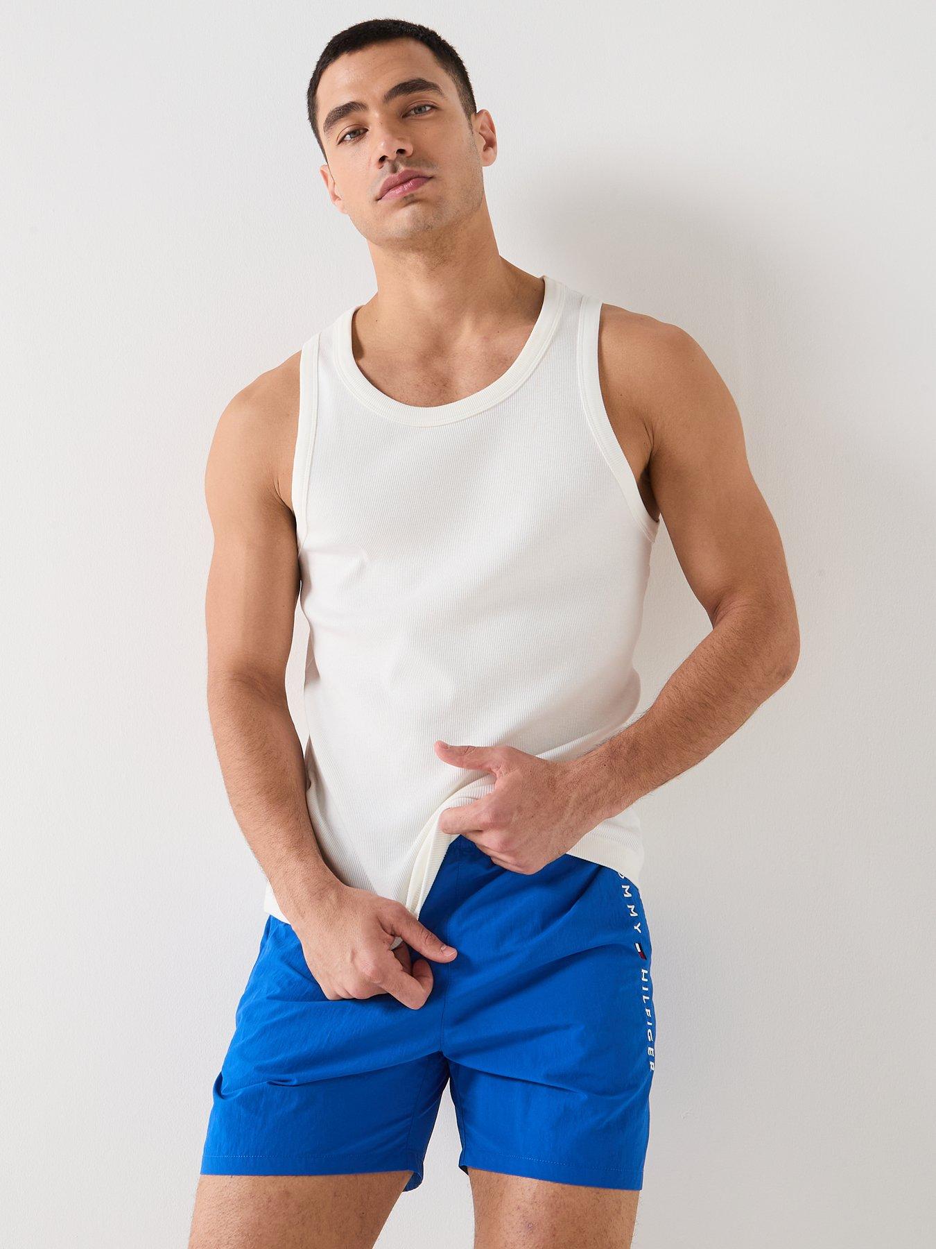 Image 5 of 6 of Tommy Hilfiger Side Linear Logo Swim Shorts - Blue