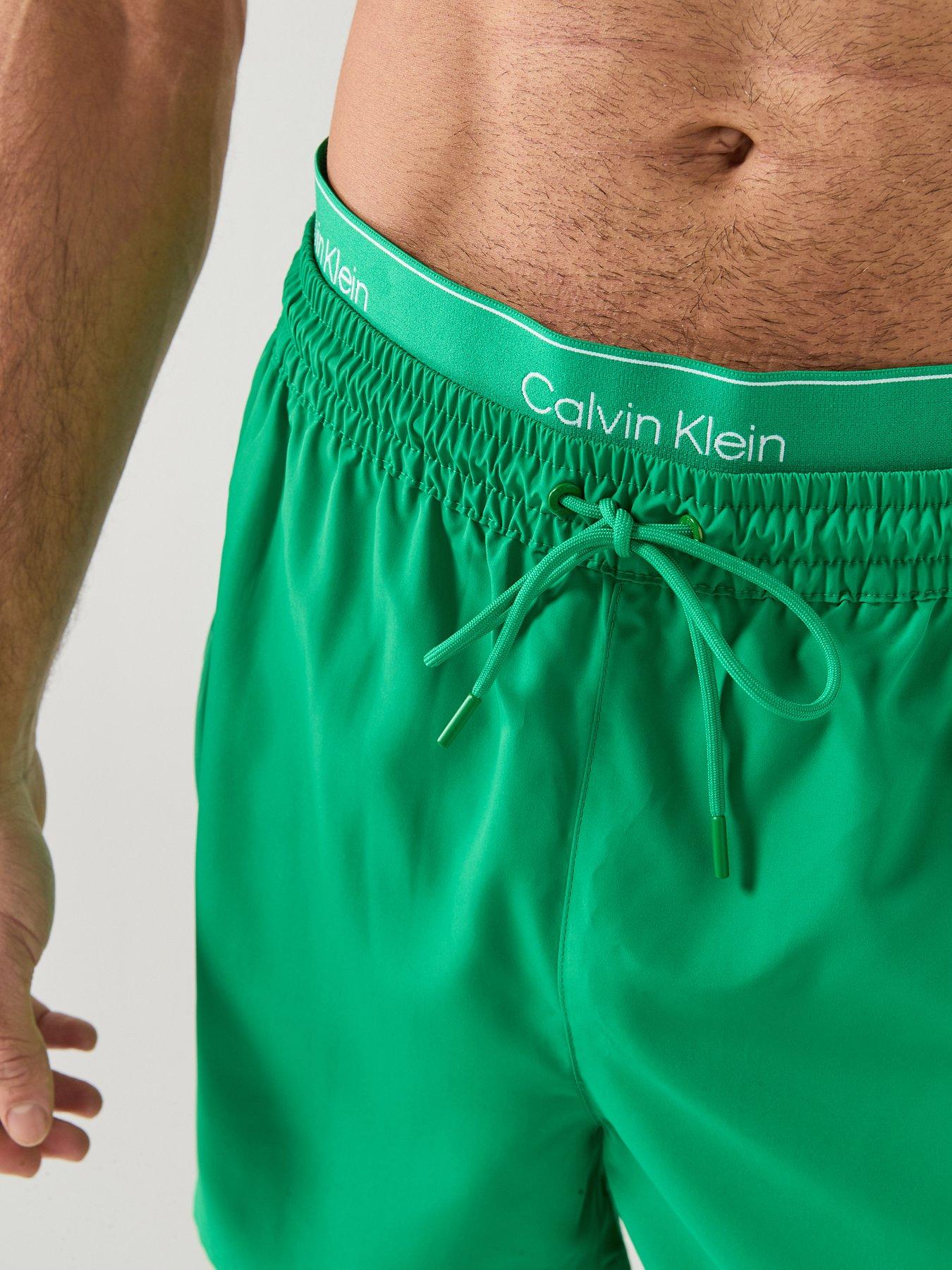 Image 5 of 6 of Calvin Klein Essential Double Waistband Medium Swim Shorts - Bright Green