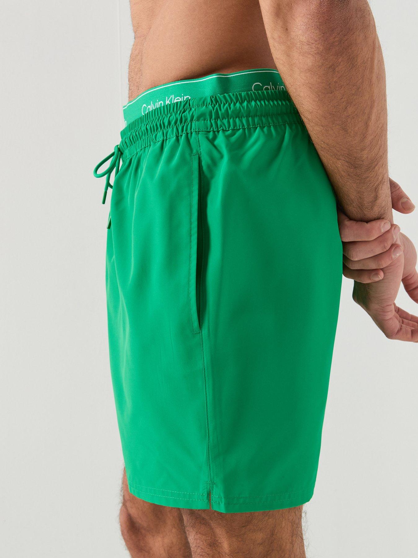 Image 6 of 6 of Calvin Klein Essential Double Waistband Medium Swim Shorts - Bright Green