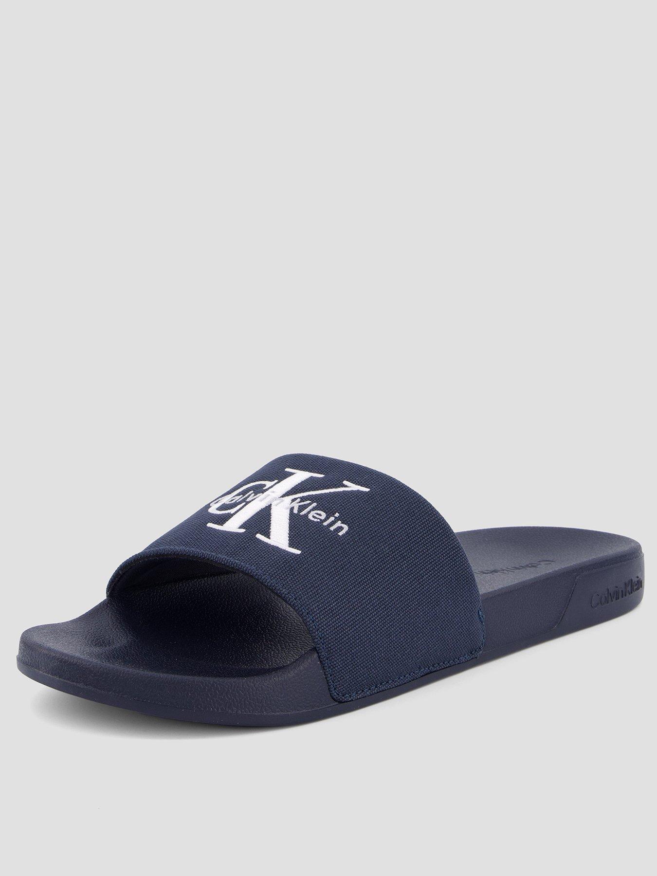 Image 1 of 7 of Calvin Klein Essential Signature Logo Slider - Navy