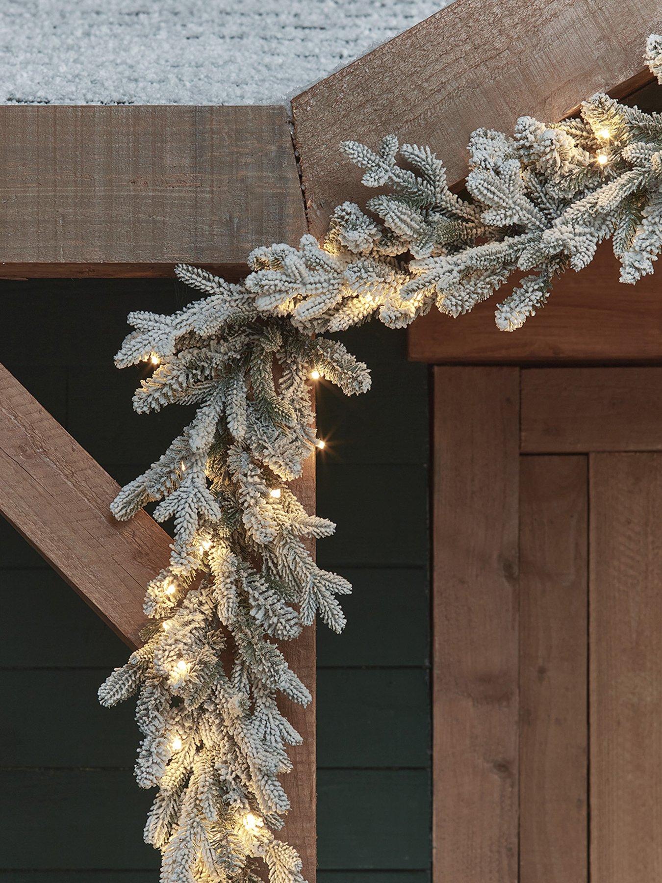 Lights4Fun 2.5m Pre Lit Outdoor Snowy Christmas Garland