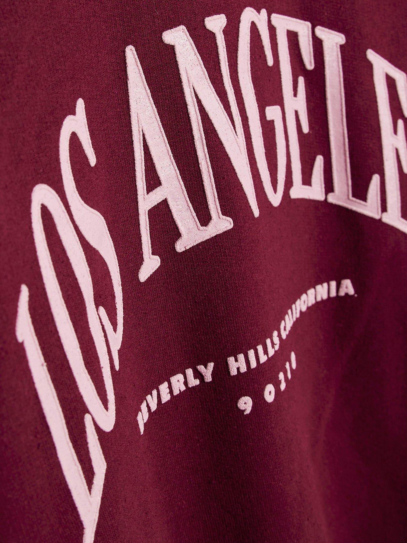 Image 4 of 4 of River Island Older Girls Los Angeles Sweatshirt - Red