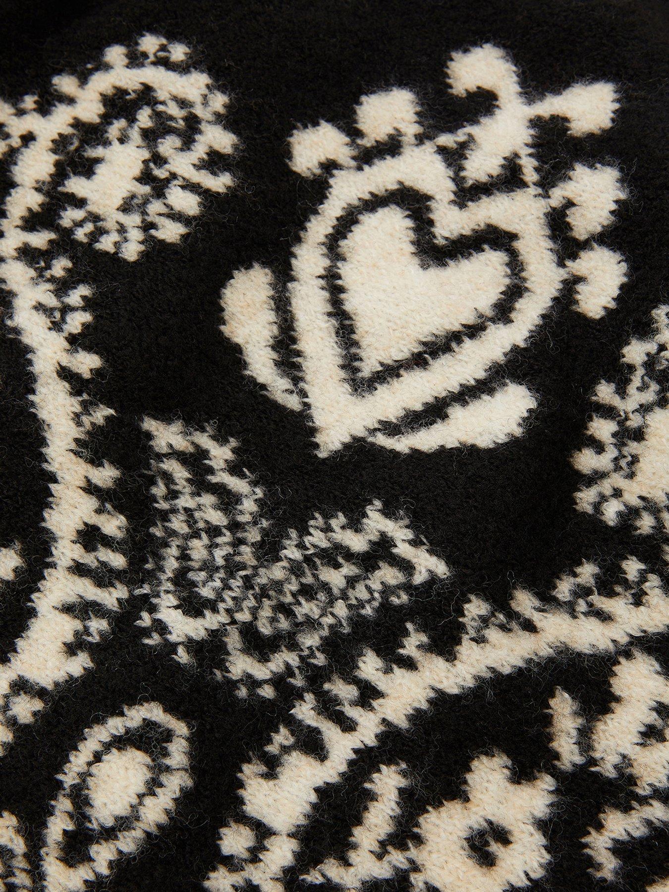 Image 4 of 4 of Accessorize Large Paisley Knitted Triangle Scarf