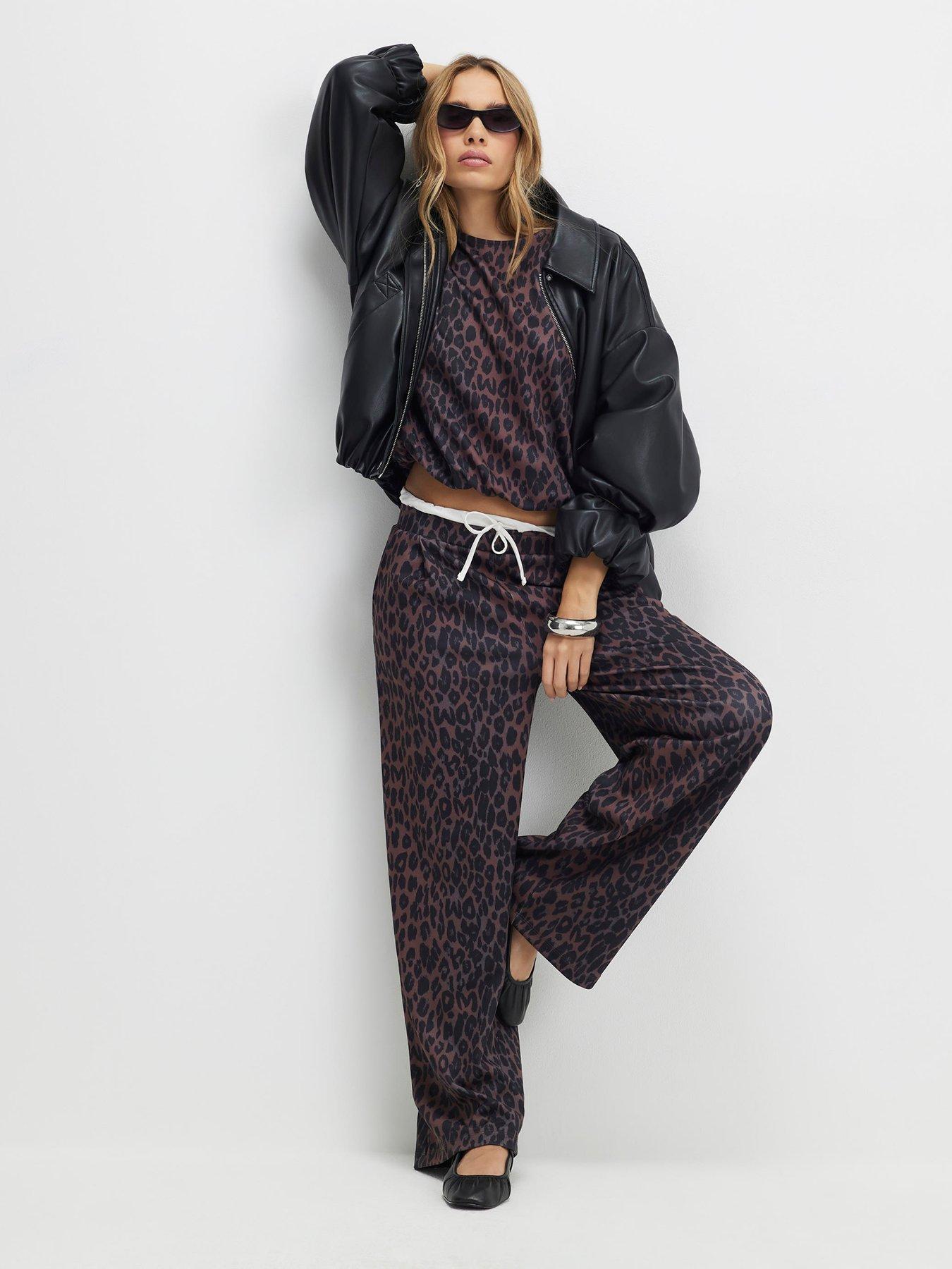 Image 4 of 4 of River Island Leopard Print Tie Side Bubble Hem Top - Black