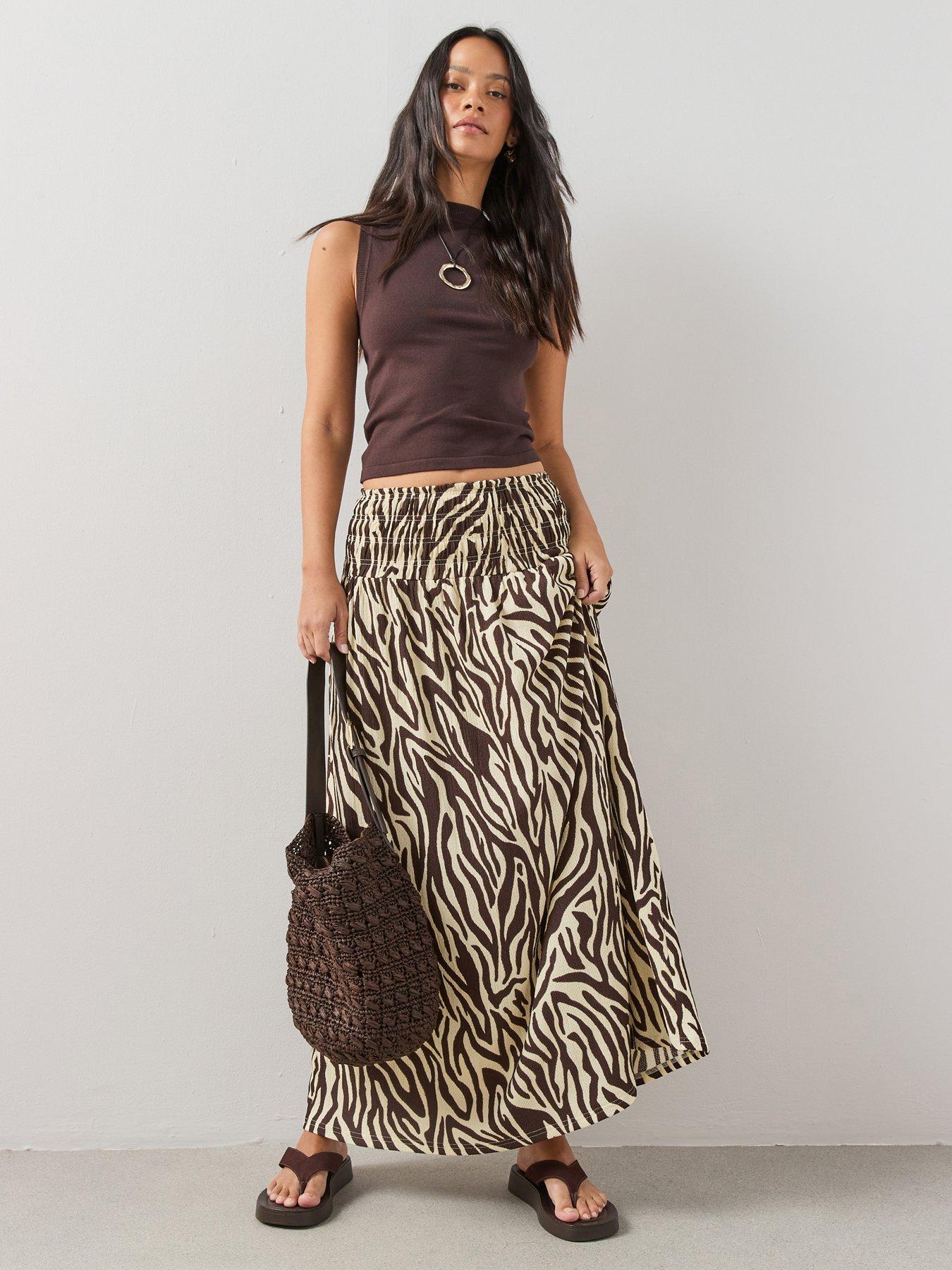 Image 1 of 7 of The Very Collection Printed Textured Stretch Maxi Skirt - Brown