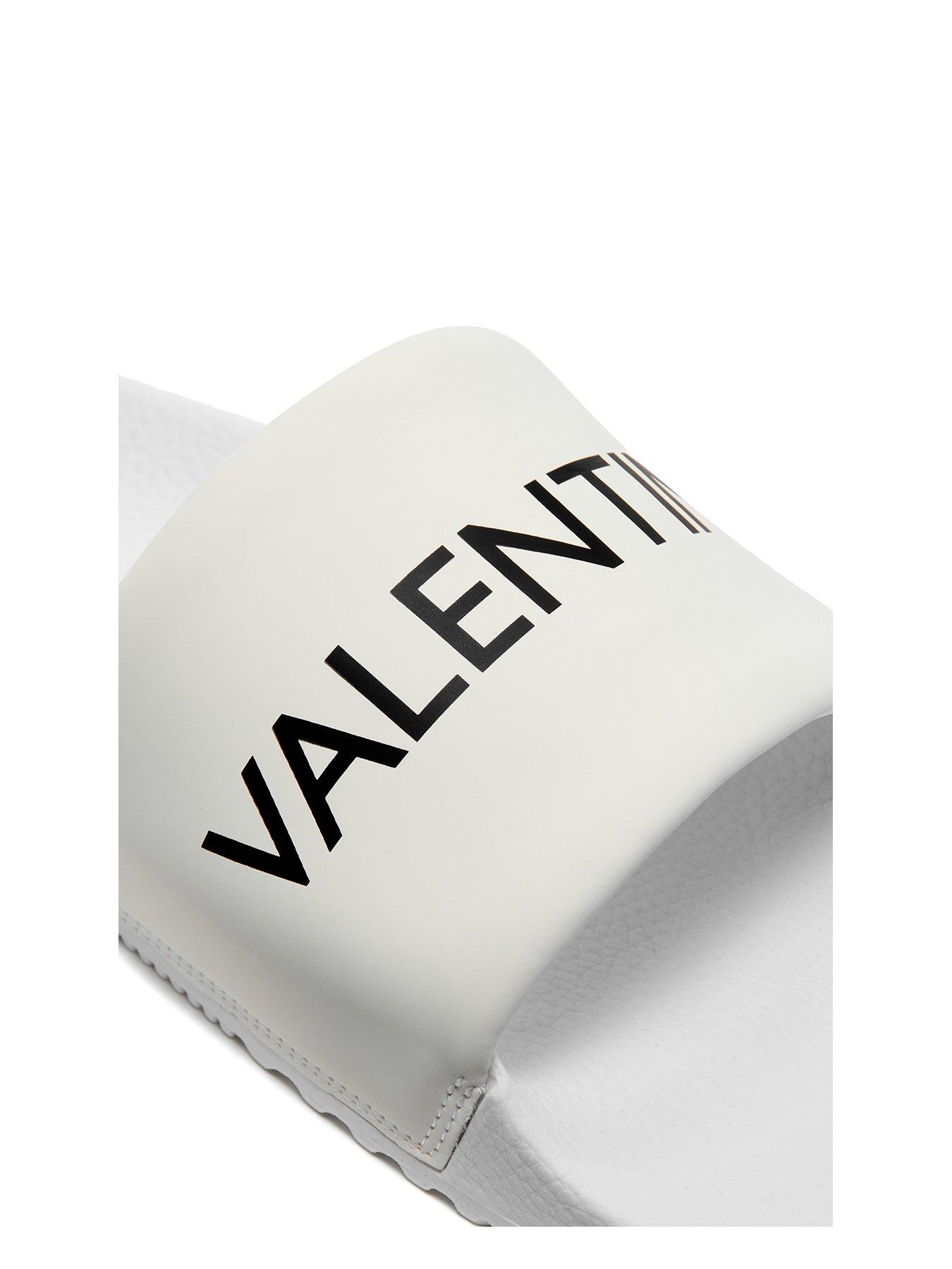 Valentino White Slides with Black Logo VLogo Signature embellished leather slides in white  main image 3