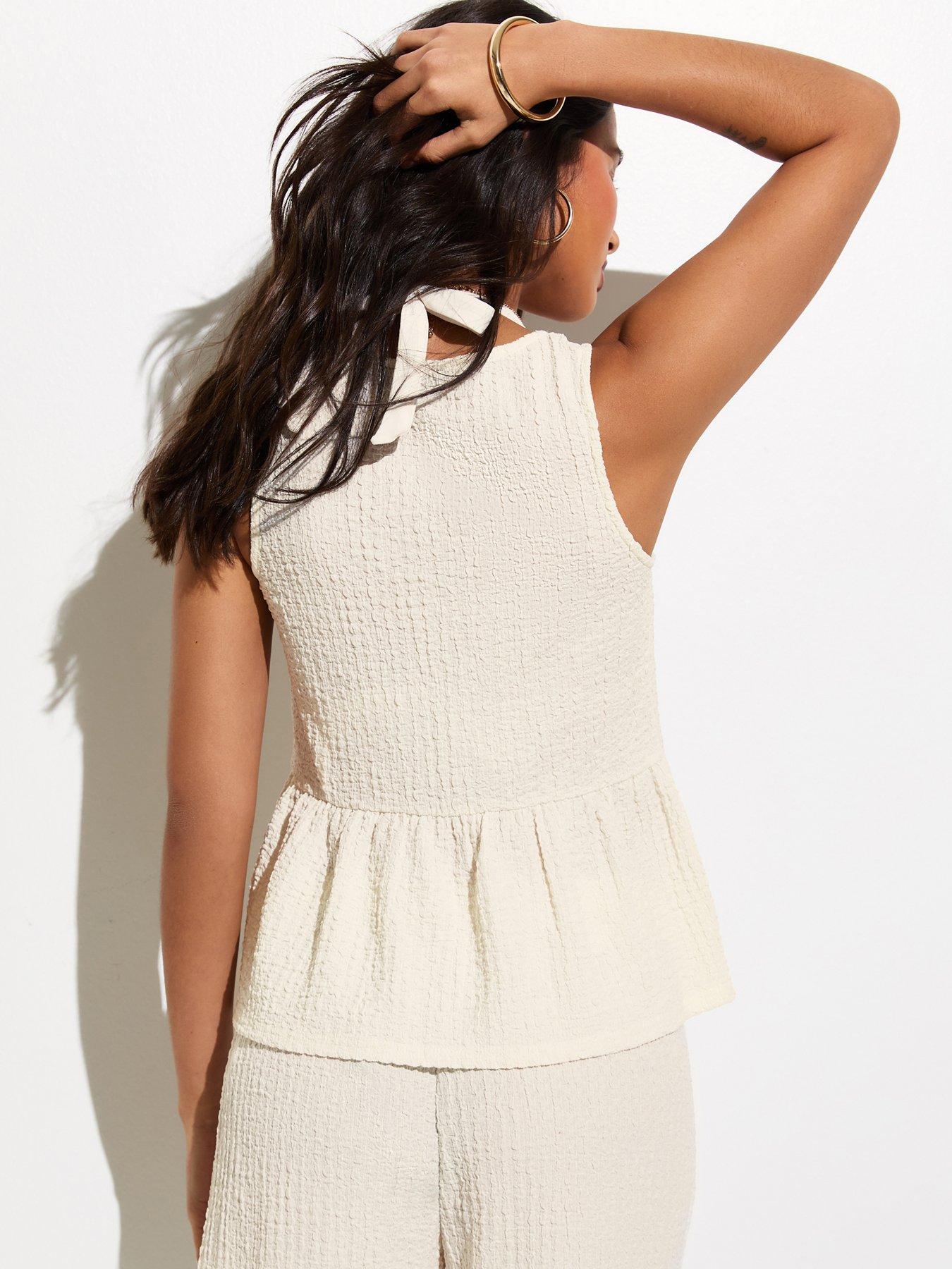 Image 2 of 7 of New Look Textured Jersey Peplum Beach Top - White