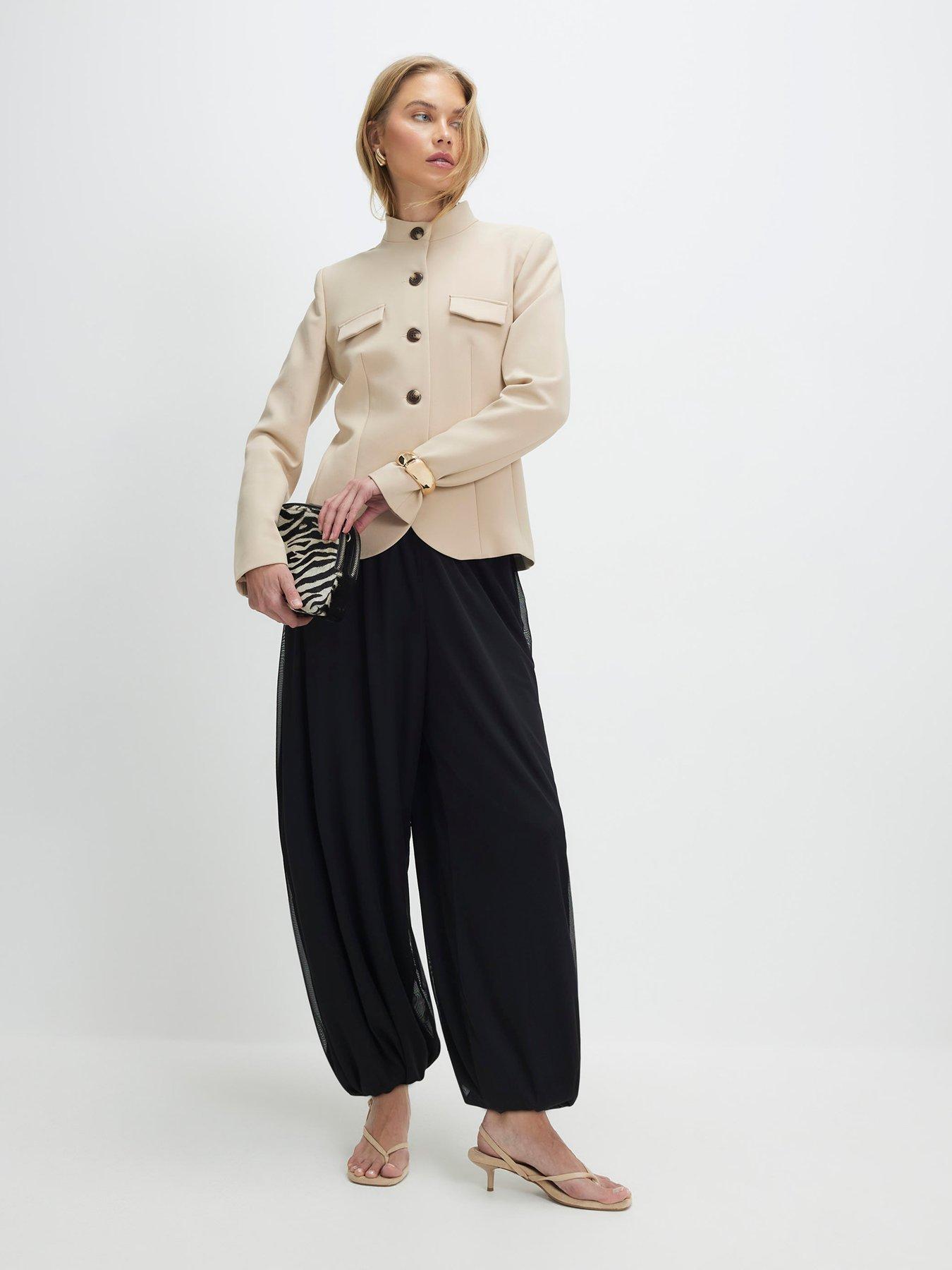 Image 1 of 4 of River Island Bubble Hem Balloon Trousers - Black