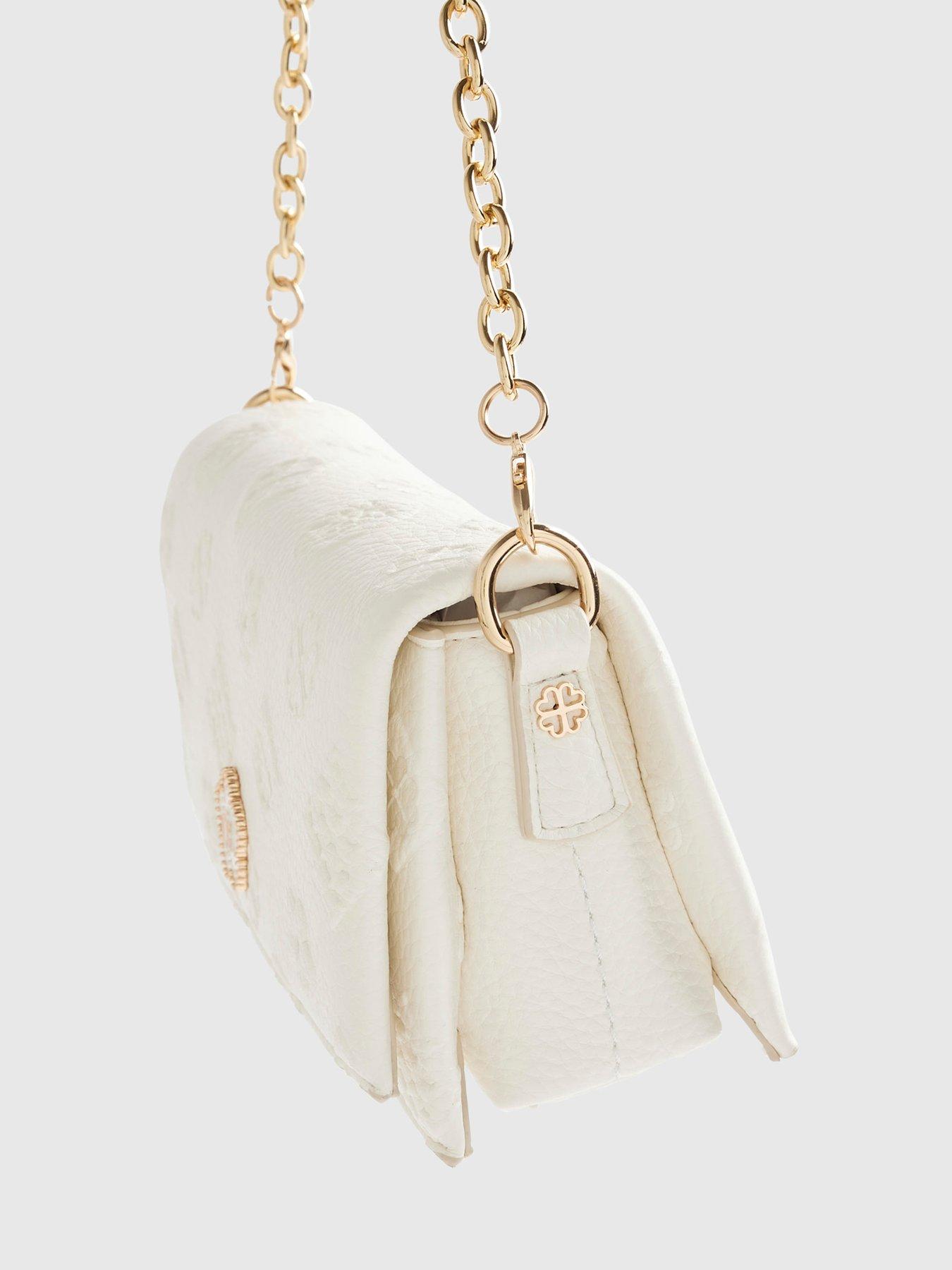 Image 5 of 6 of River Island Embossed Monogram Cross Body Bag - Cream