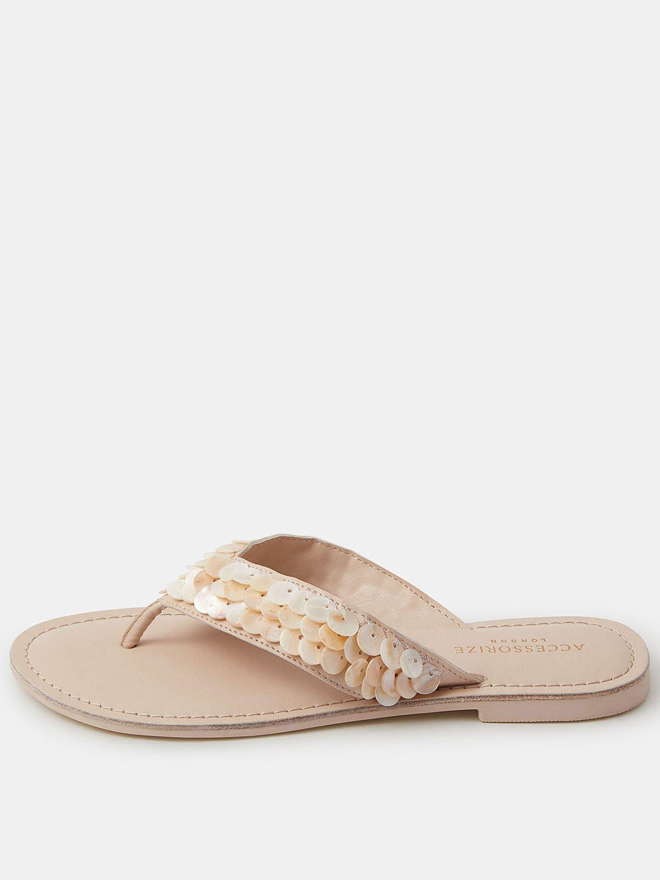 Image 1 of 4 of Accessorize Mother of Pearl Embellished Flip Flops - Cream