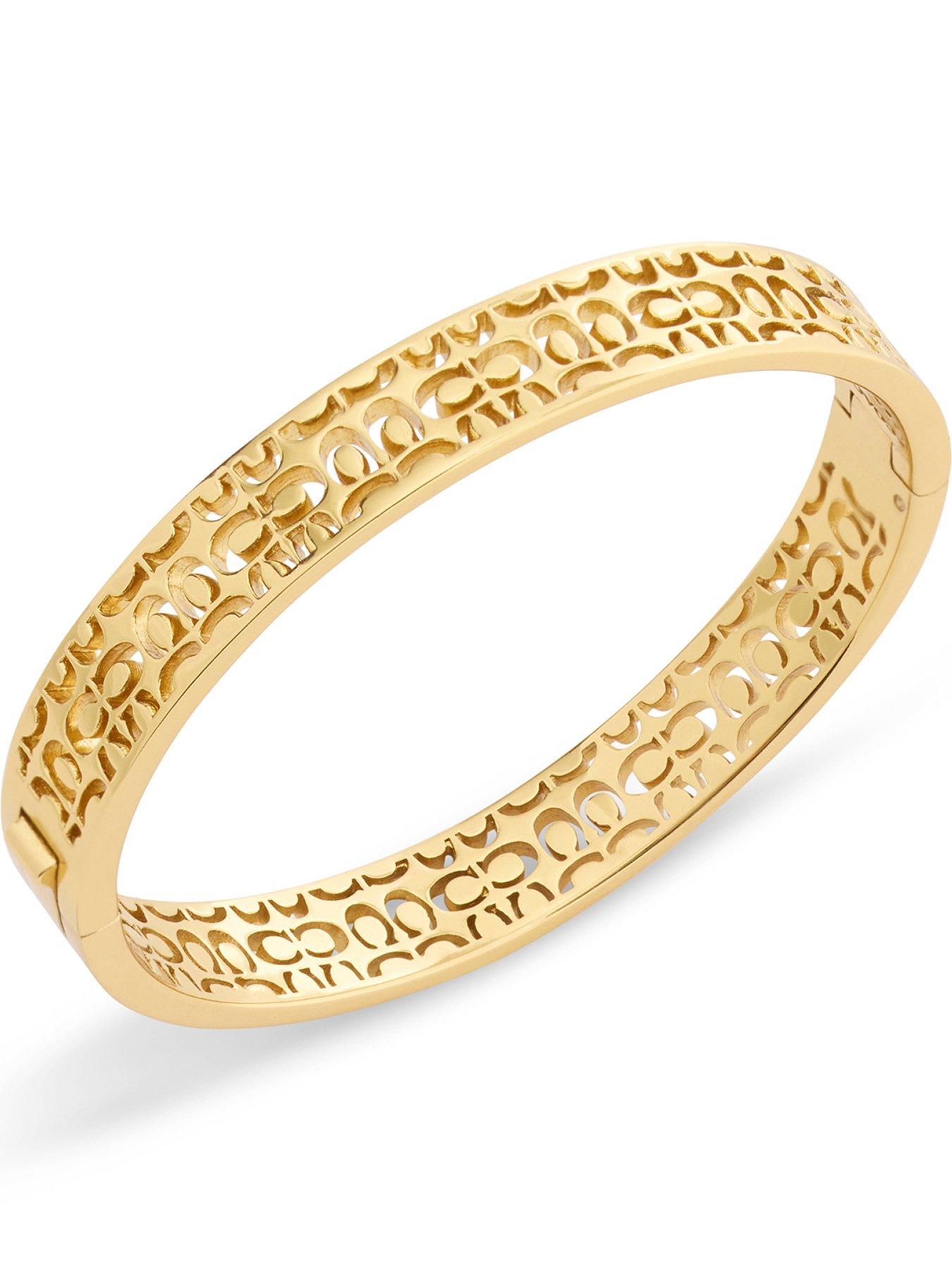 Image 1 of 3 of COACH Quilted C Hinged Bangle - Gold