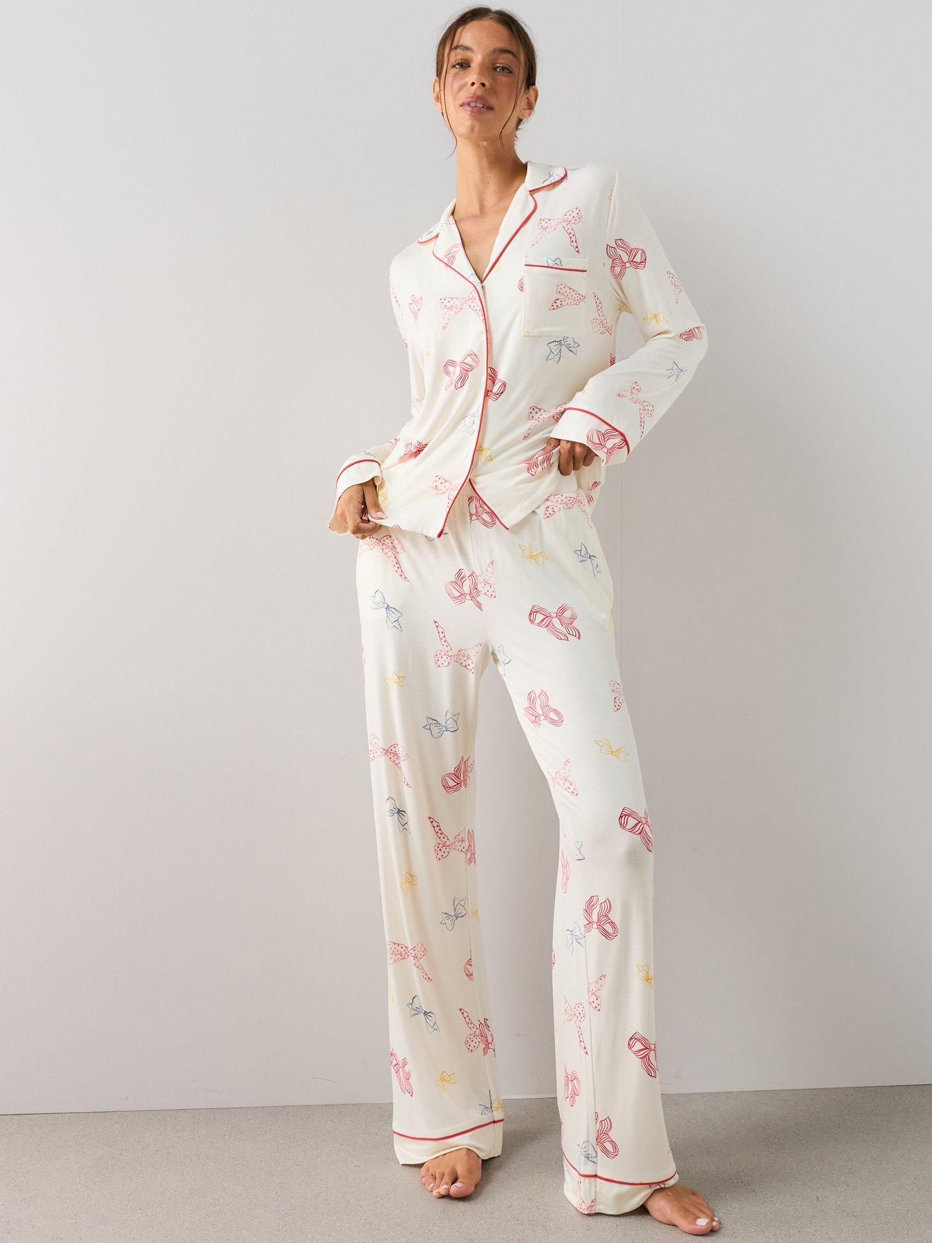 Image 1 of 7 of The Very Collection Jersey Revere Bow Print Pyjama Set - Cream