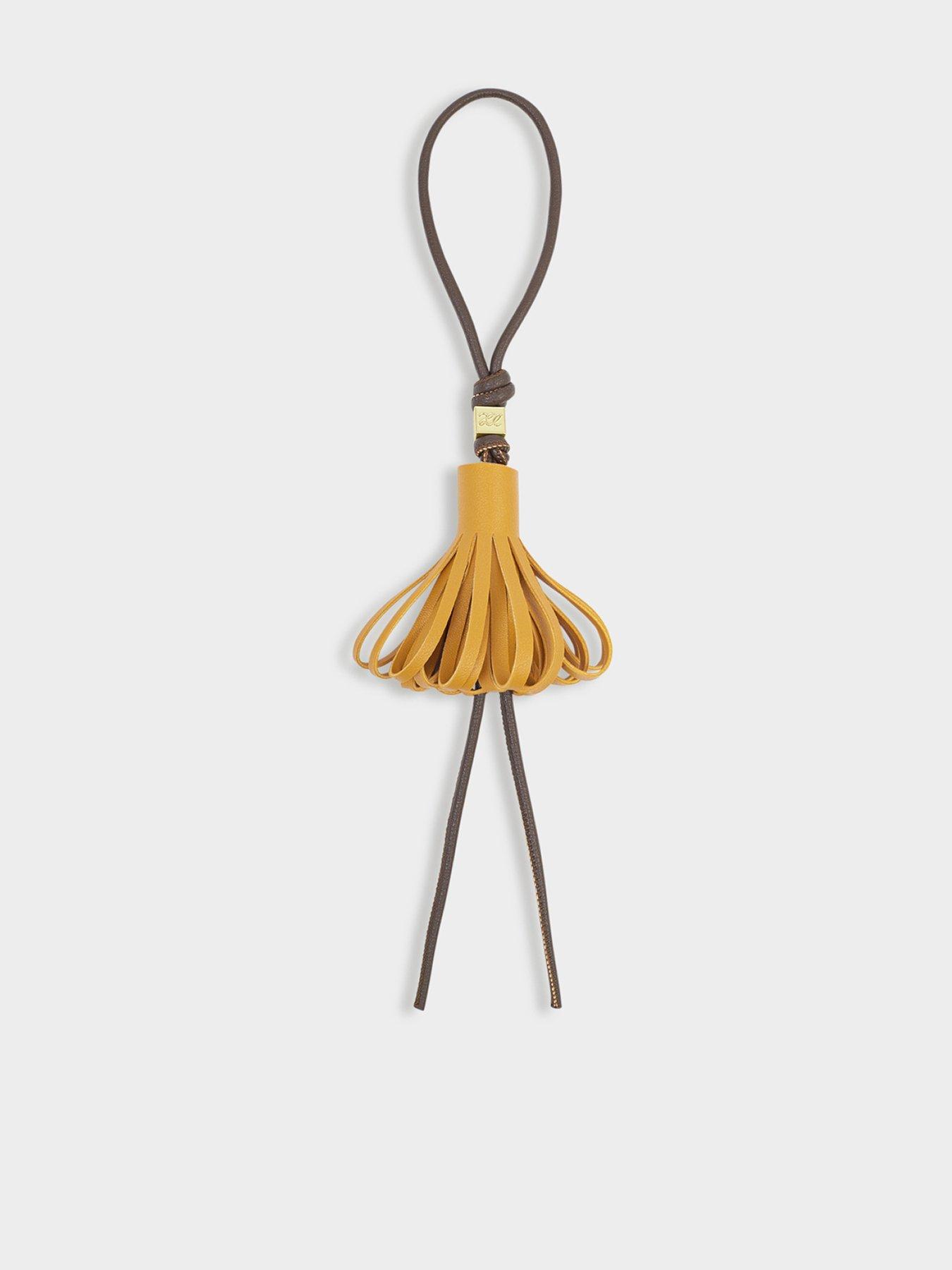 Image 1 of 5 of Katie Loxton Tassel Bag Charm - Bitter Chocolate/Yellow