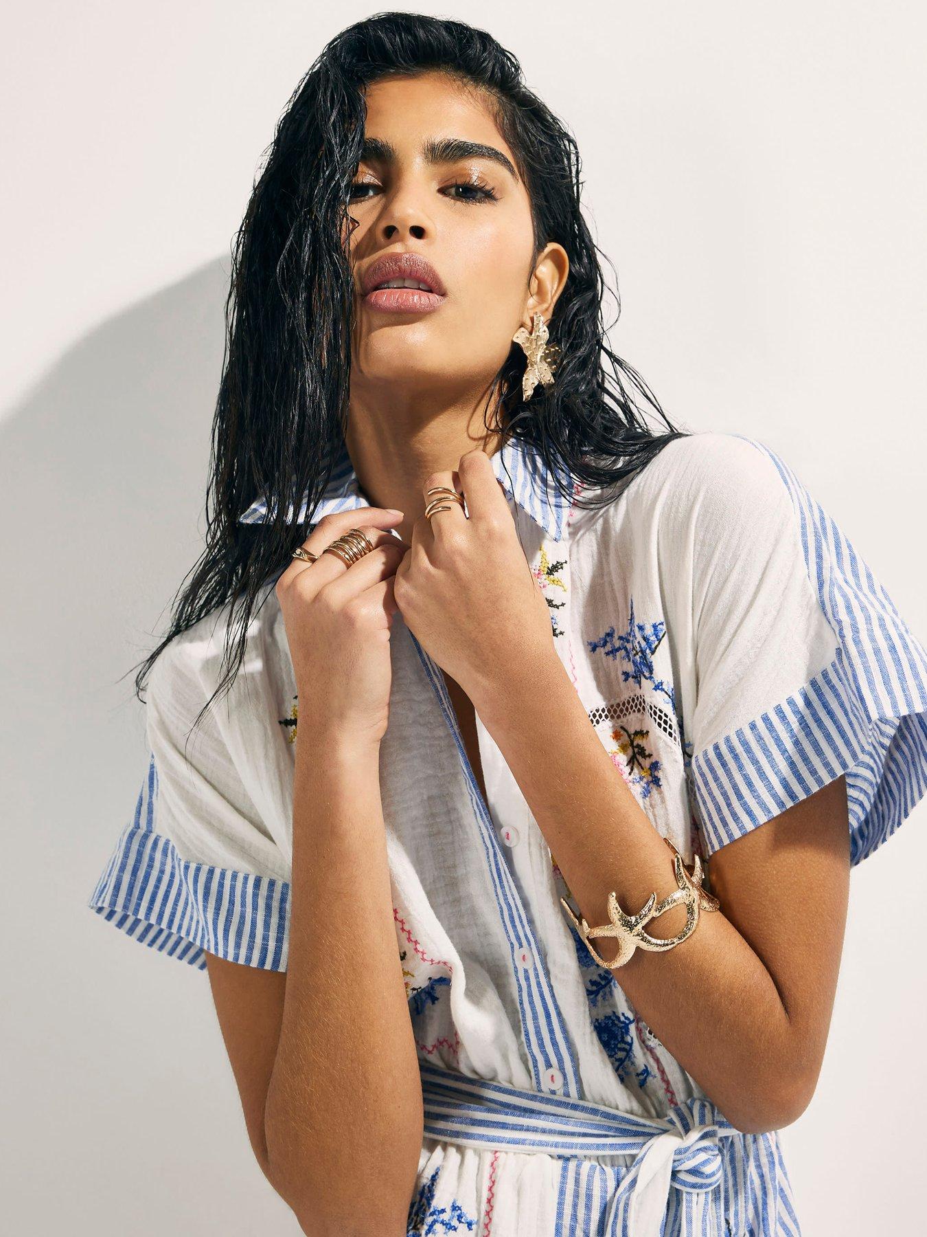Image 4 of 4 of River Island Embellished Patchwork Stripe Playsuit - White