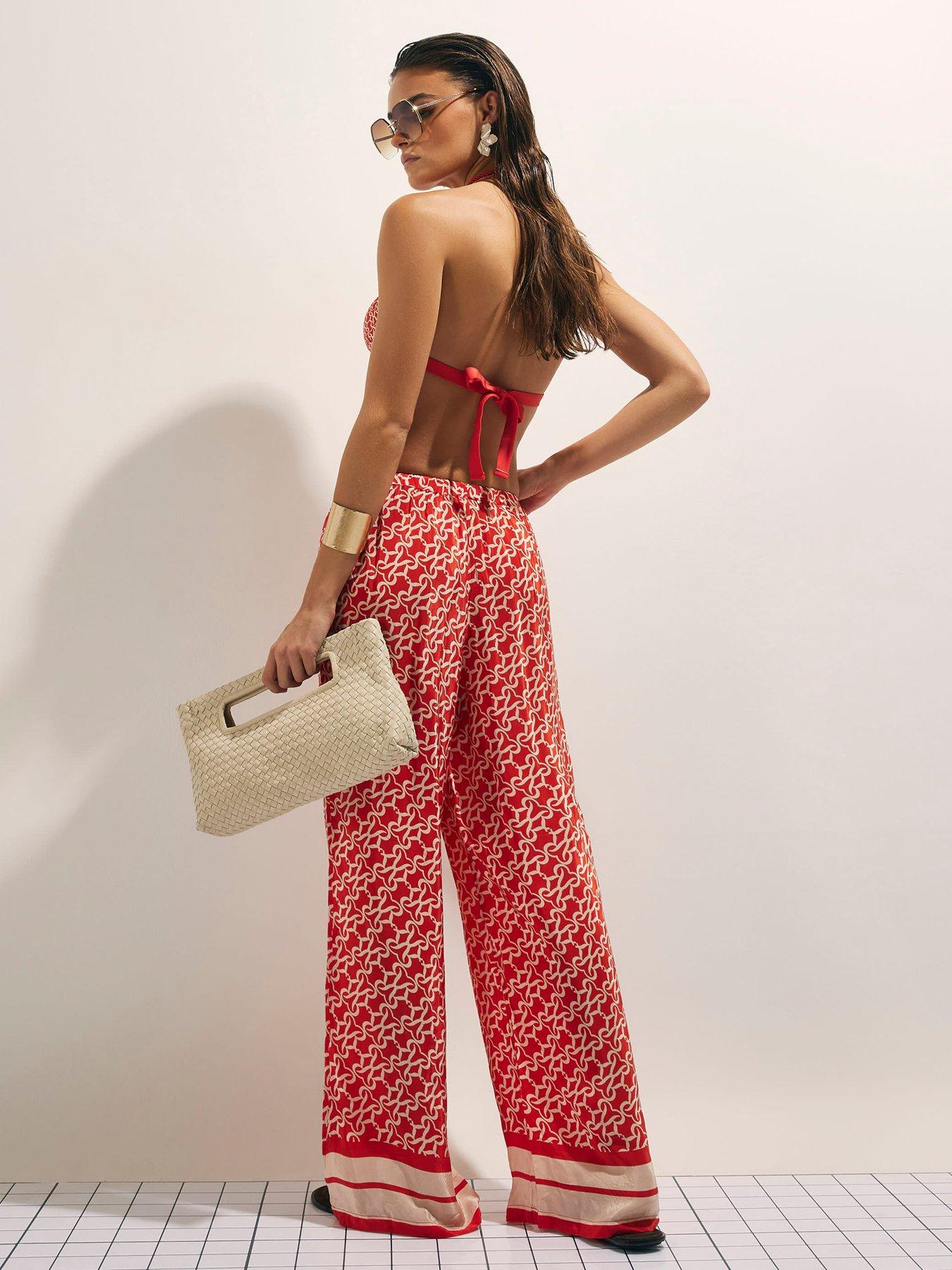 Image 2 of 4 of River Island Monogram Trousers - Orange