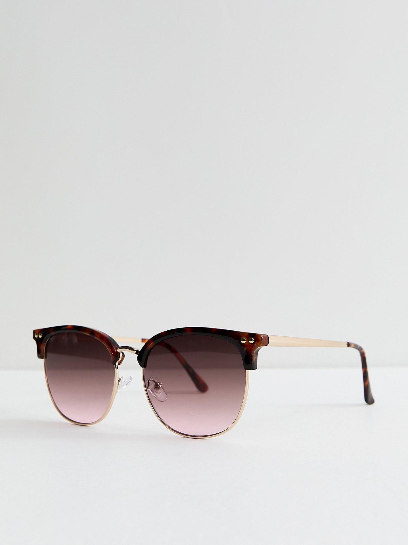 Image 1 of 4 of New Look Tortoiseshell Effect Round Frame Sunglasses - Brown