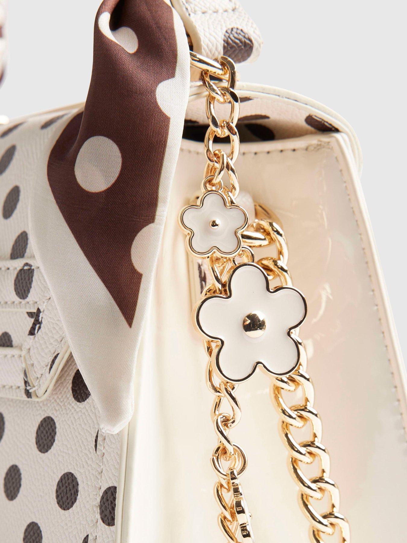 Image 5 of 6 of River Island Polka Dot Mini Charm Tote Bag - Beige