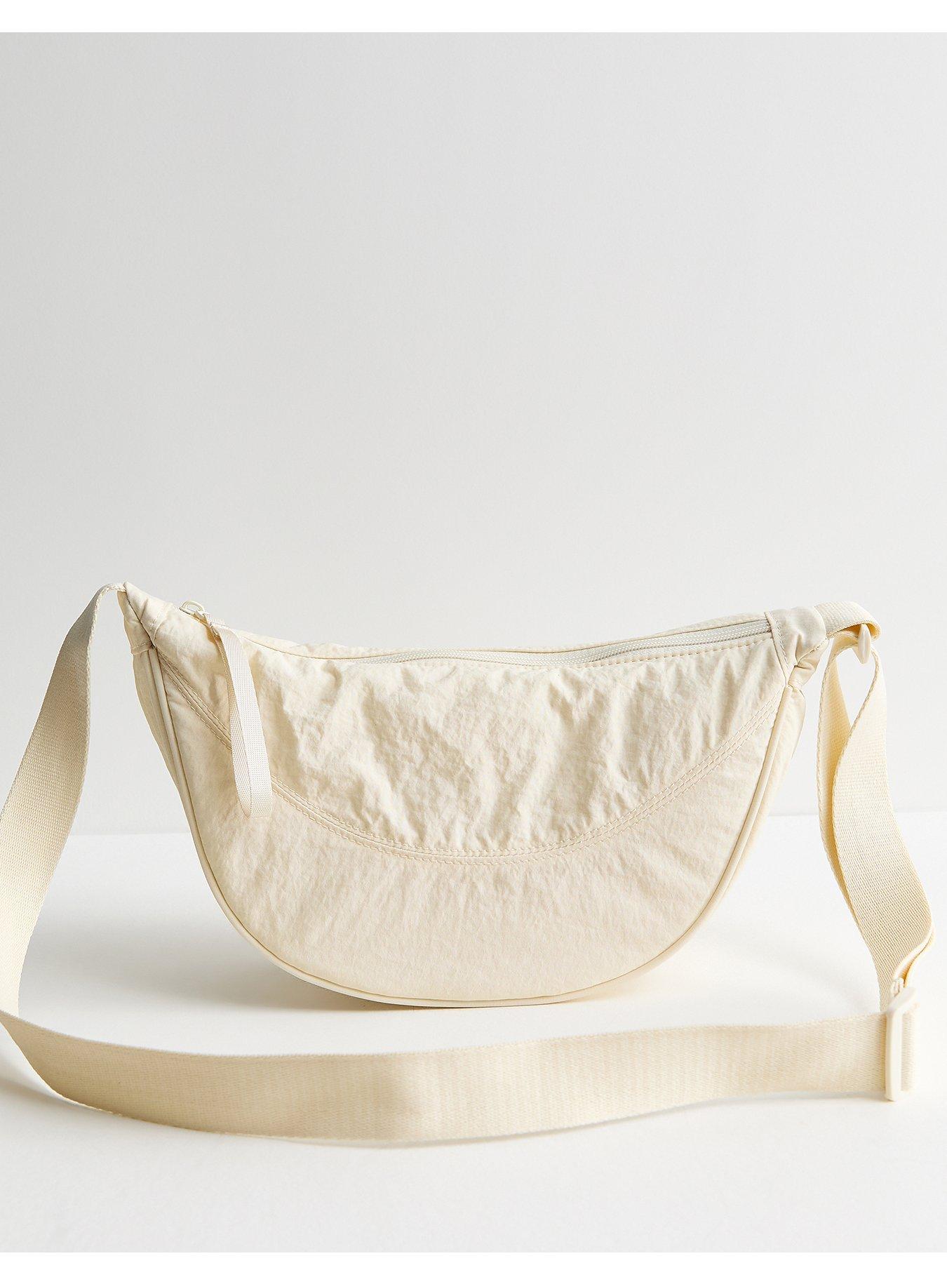 Image 2 of 5 of New Look Cream Plain Curved Crossbody Bag