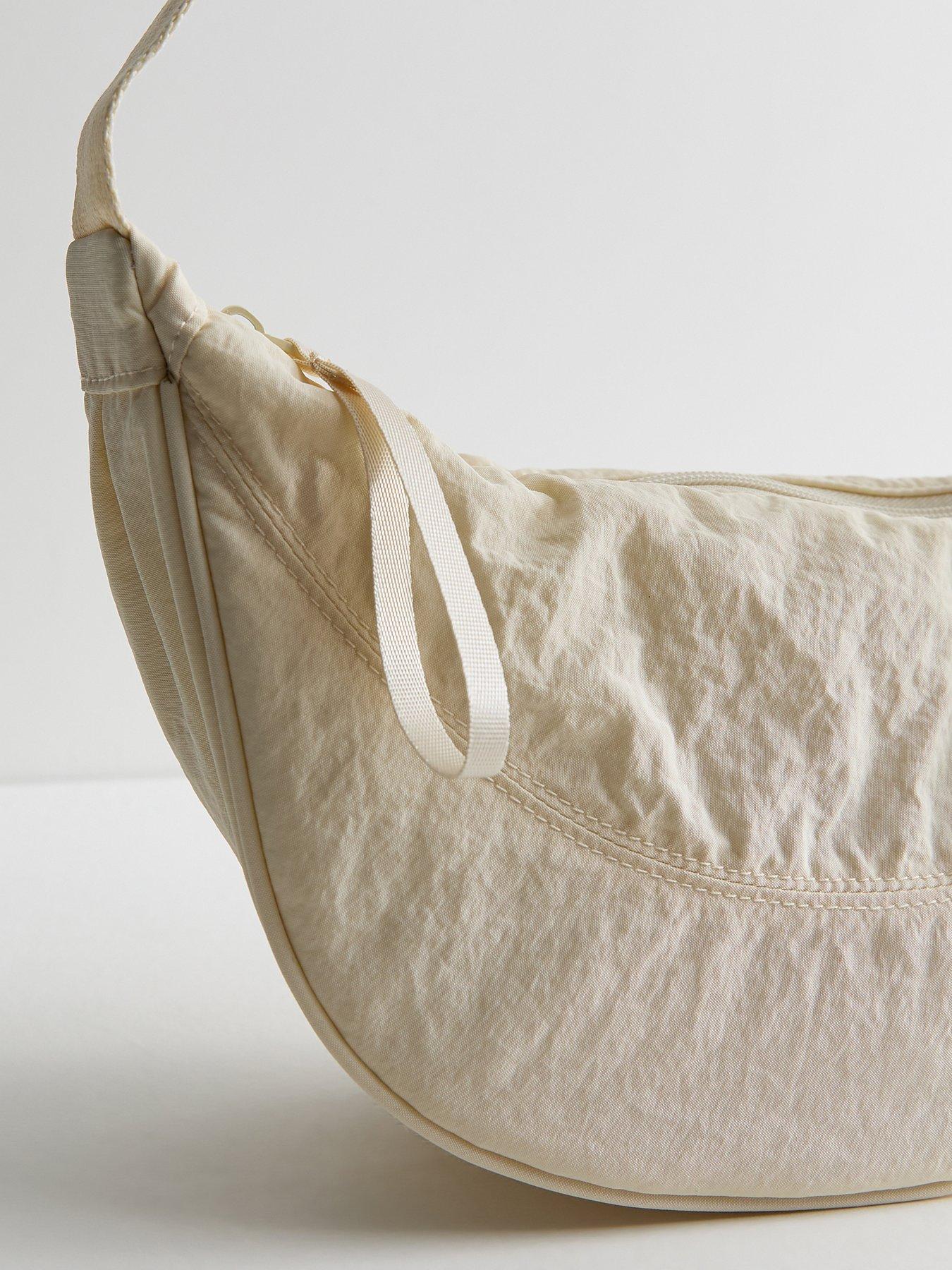 Image 4 of 5 of New Look Cream Plain Curved Crossbody Bag