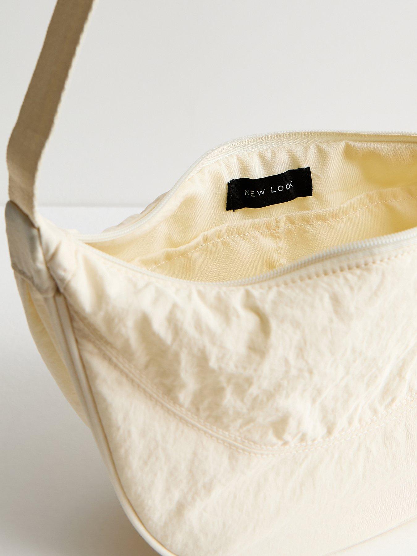 Image 5 of 5 of New Look Cream Plain Curved Crossbody Bag