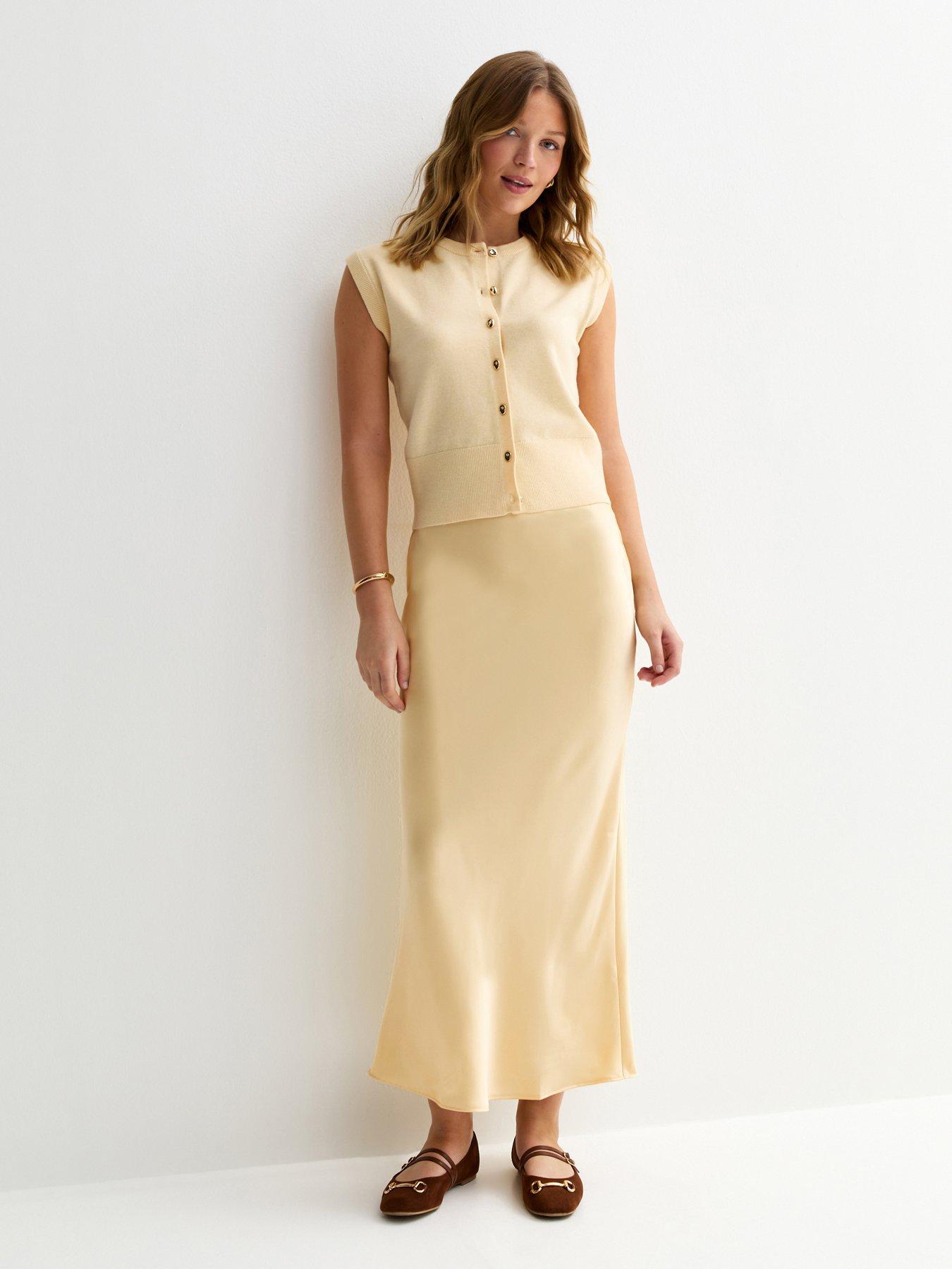 Image 1 of 5 of New Look Satin Bias Cut Midi Skirt - Light Yellow