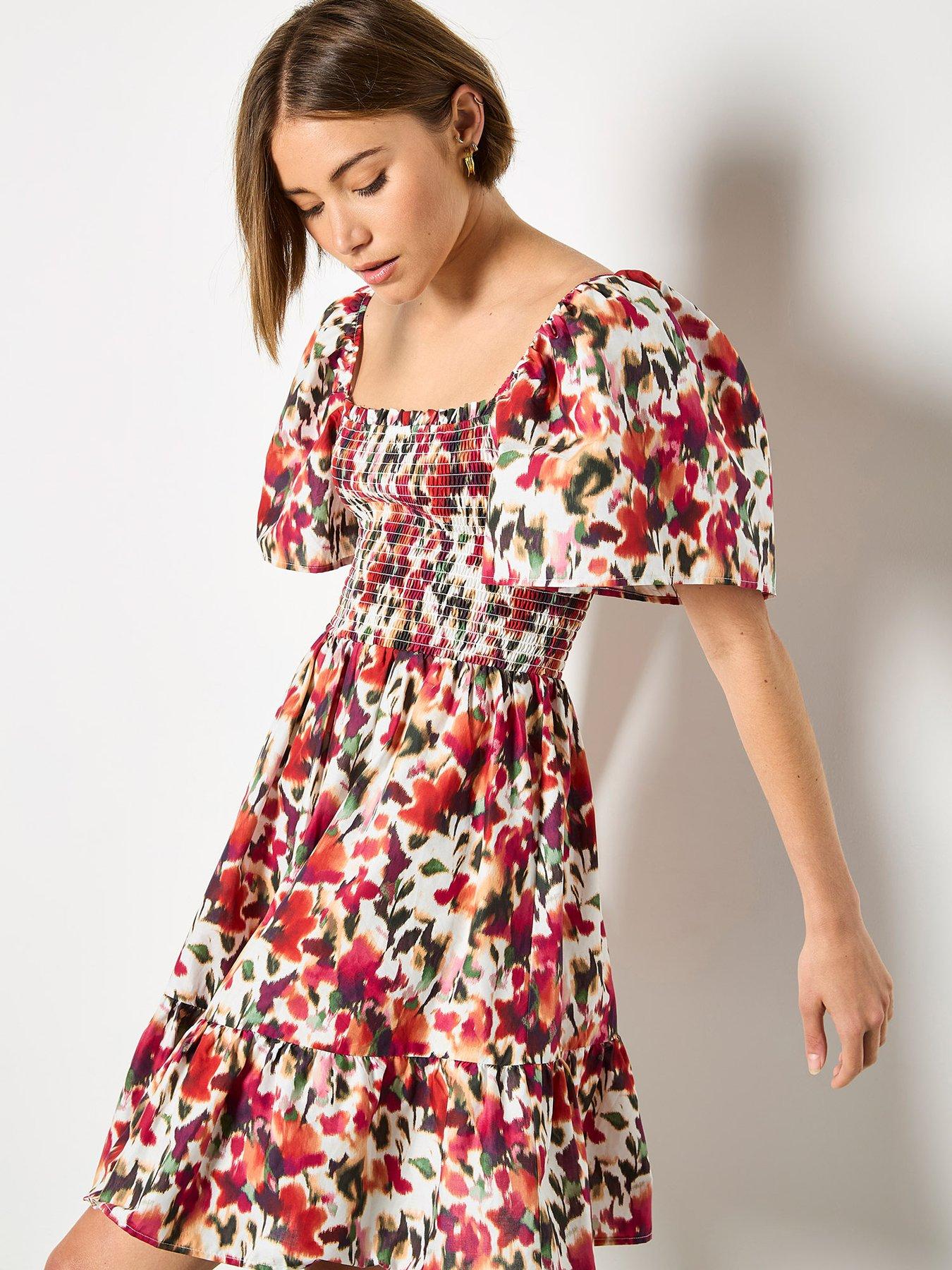 Apricot Smocked Ikat Floral Cotton Drs