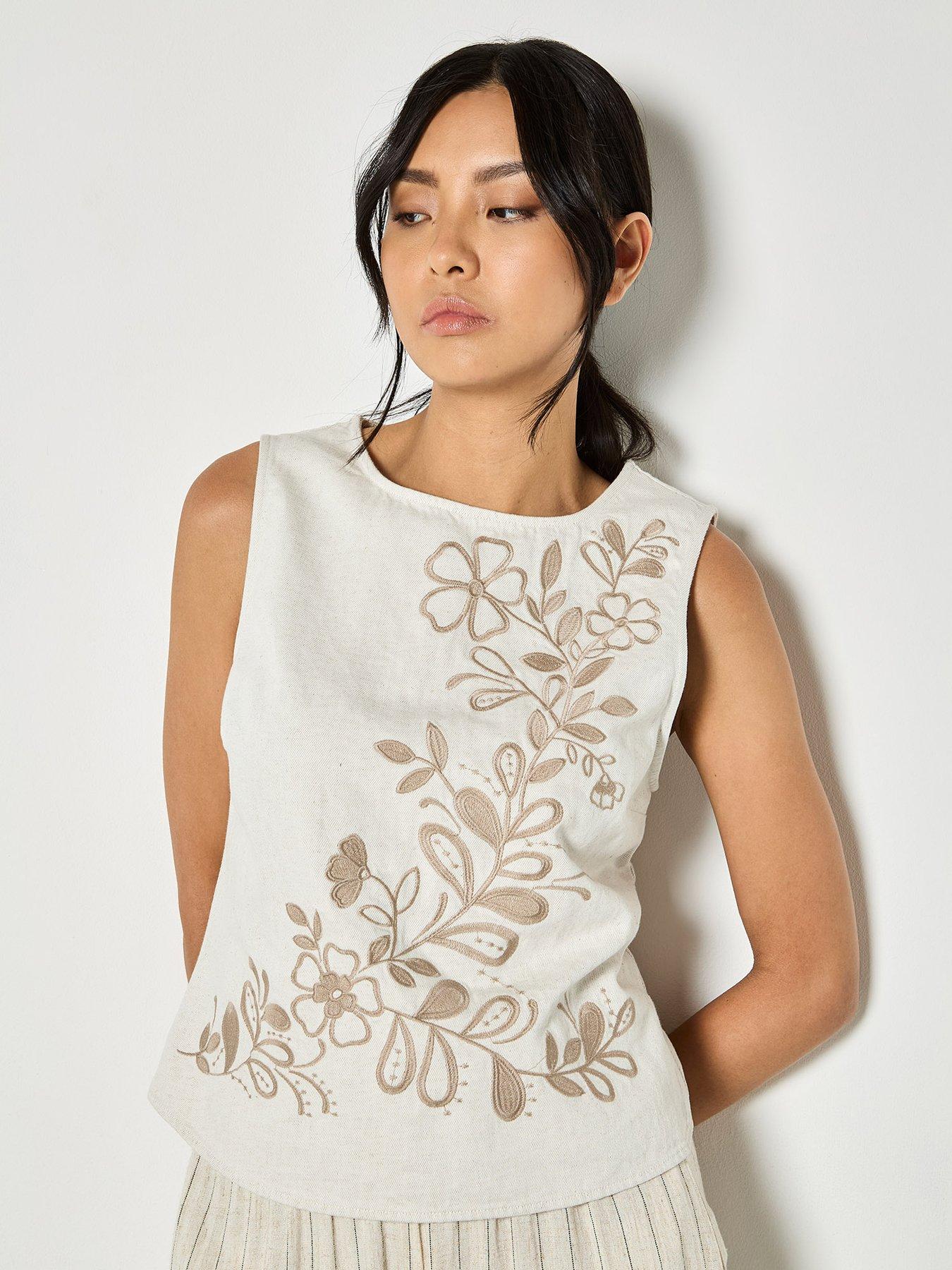 apricot-embroidered-front-shell-top