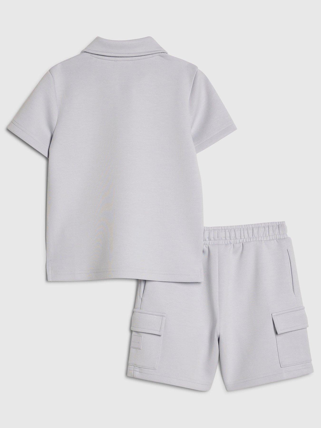 Image 2 of 5 of River Island Mini Mini Boys Luminis Badge Polo T-Shirt &amp; Shorts Set - Light Blue